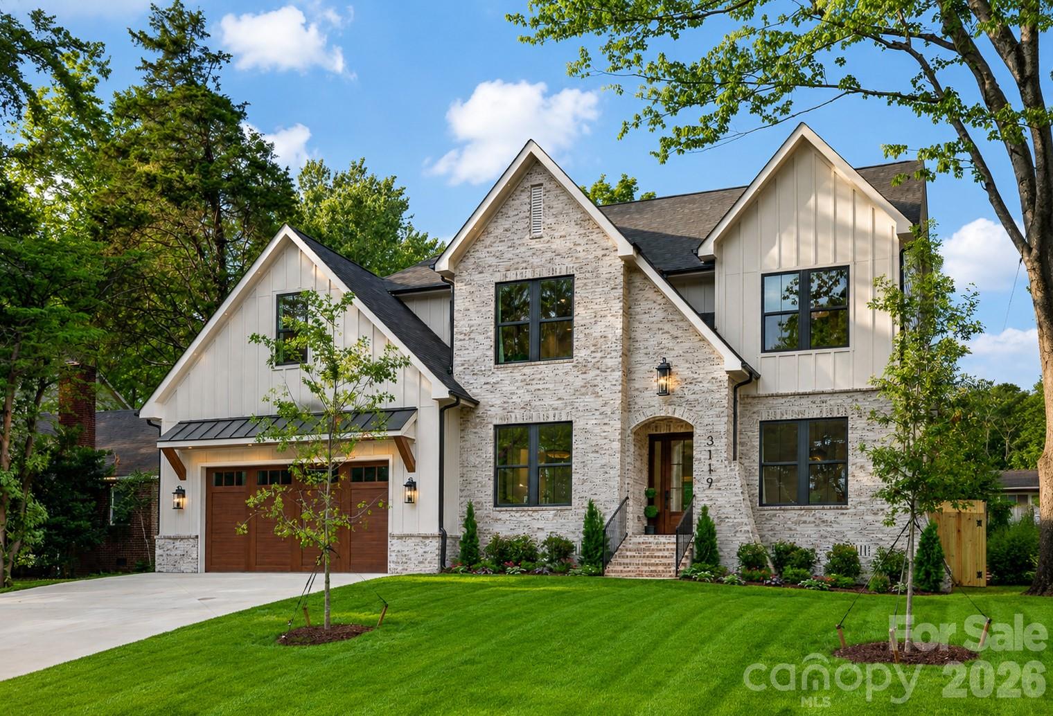 Nestled in the highly desirable Commonwealth neighborhood, this exceptional new construction home offers an unparalleled combination of luxury, thoughtful curation and an unbeatable location. Showcasing elevated craftsmanship and designer finishes throughout, this stunning residence features an open, light-filled floor plan with spacious living areas, office/guest bed, Butler's pantry, luxury designer light fixtures, Venetian plaster surround gas fireplace with precast framing, dimmable toe kick/under cabinet/shower niche lighting and 7.25" wide-plank Hickory hardwoods. The heart of the home is the breathtaking chef’s kitchen, complete with Calcutta Quartz 2" countertops, custom maple and white cabinetry and an oversized waterfall edge island taylored for entertaining. The luxurious primary suite provides a private retreat with trending Venetian plaster surround fireplace, spa-inspired bathroom and an expansive walk-in closet complete with a dedicated 2nd laundry space. The second level features three additional bedrooms, a thoughtfully planned laundry suite with custom cabinetry and utility sink, along with a spacious loft. An oversized bonus room offers endless flexibility—ideal for entertaining, a media room, gym, or playroom of your choice! Enjoy effortless indoor-outdoor living with a covered porch overlooking the private, fully fenced backyard—perfect for relaxing or entertaining. Ideally located within walking distance to the vibrant shops, restaurants, and charm of Plaza Midwood, this home delivers the perfect blend of modern luxury and urban convenience.