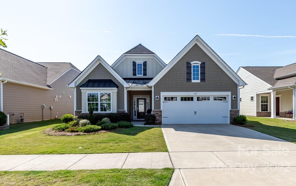 Beautiful Ranch Home in the gated neighborhood of Tree Tops. It was designed exclusively for the active adult lifestyle. Nestled amid an old growth forest, the neighborhood features resort-style amenities. Check out the Tree Tops Website: https://www.treetopscommunity.com/home/ This Delightful home has multiple upgrades including hardwood floors, chef’s kitchen w/quartz countertops, walk-in pantry, gas oven and range, oversized cabinets, and breakfast bar on one side of the enormous island accented by pendant lighting. The Great Room boasts a Fireplace w/gas logs and leads out to a multi-seasonal covered porch, enclosed by an Eze-Breeze system. Enjoy looking out onto a manicured lawn with a custom fireplace on a Paver Patio. Adjacent to the Kitchen and Great Room is the cozy Breakfast Room. Additionally, there is a formal Dining Room that can be easily converted to a 3rd Bdrm, Office, or Game Room. Don’t miss the Owners Suite with large Bath, including walk-in Shower and huge closet.
