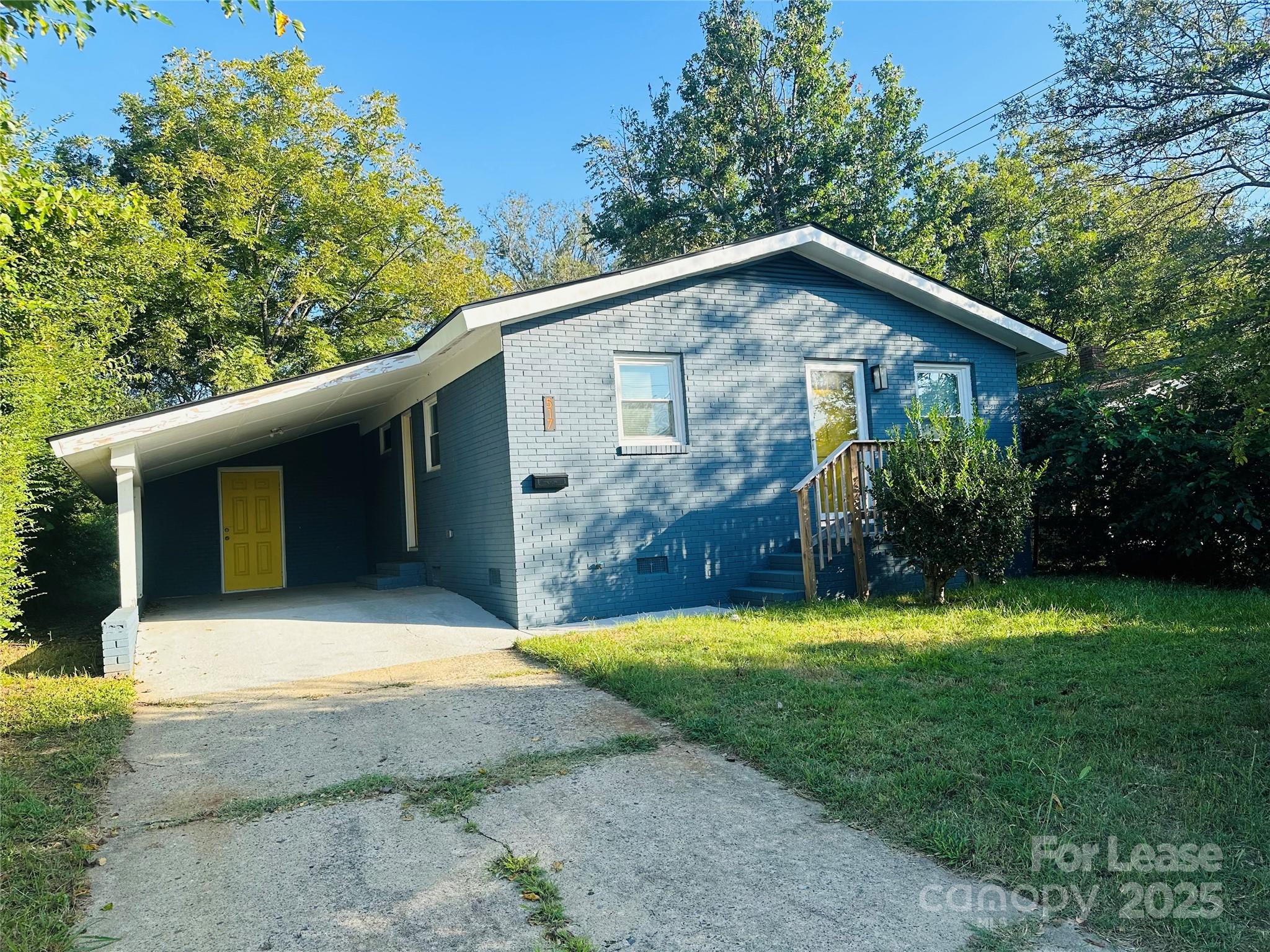 This charming two bedroom home in downtown Rock Hill is move-in ready! The floor plan offers a cozy living room that connects to the kitchen, two spacious bedrooms and a full bathroom. LVP flooring throughout home, newer kitchen appliances, one car attached carport with additional storage room that houses water heater and washer/dryer hookups, large backyard with trees for shade.
