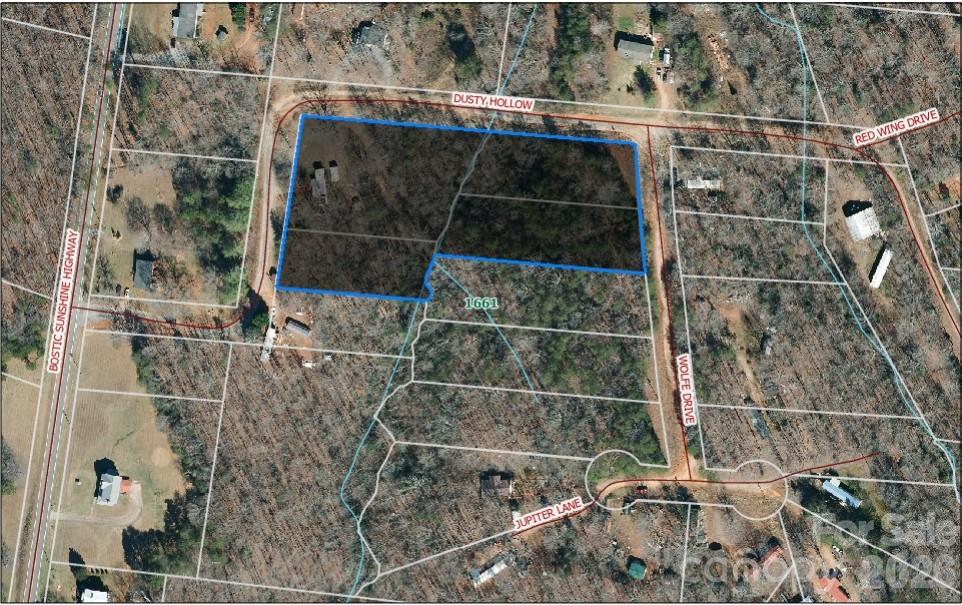 This 3.28-acre property, made up of 4 individual lots, offers a peaceful and private setting in Bostic with scenic mountain views. Included in the sale is a 2004 30-ft Coachman camper, a large camper shed, and two outbuildings—perfect for storage or workshop use.The property is well-equipped with essential utilities, including a septic system, a well, and two separate electric hookups—one for a manufactured home and another for the camper site. With few places available for camper lots in the area, this is a rare find. The land offers multiple buildable sites and endless possibilities—whether you're looking to build, invest, or enjoy a mountain getaway.