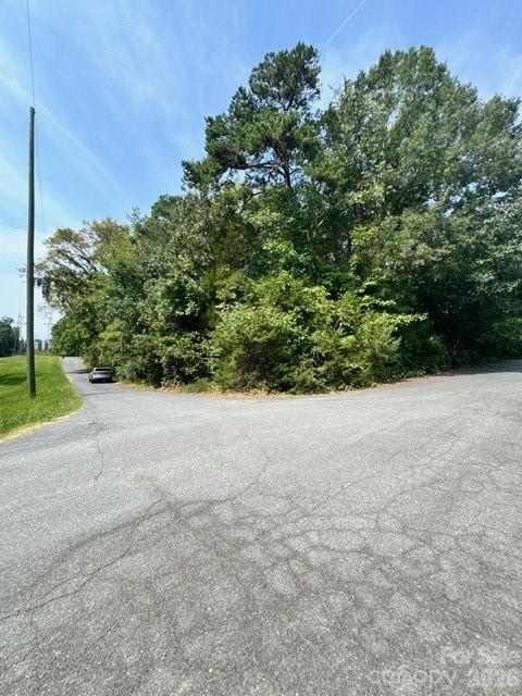 Discover the perfect opportunity to build your dream home on this .23-acre corner lot located in the heart of University City area of Charlotte. Nestled in a quiet neighborhood with paved roads on both sides, this level and wooded lot offers privacy while still being close to everything Charlotte has to offer.

Enjoy the prime location just minutes from IKEA, Topgolf, University City shops, UNC Charlotte, NoDa breweries, Uptown Charlotte, and both I-85 and I-485 for an easy commute in any direction. With quick access to shopping, dining, entertainment, and major highways, this lot provides the ideal balance of peaceful living and city convenience.

Whether you’re ready to build now or invest for the future, this lot is a must-see in a desirable and growing area of Charlotte.