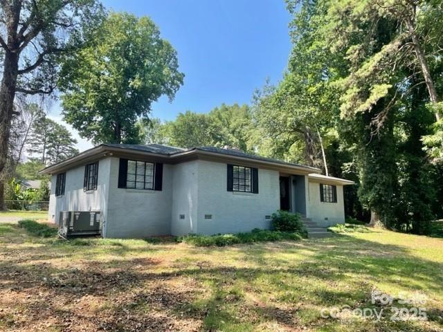 Listing Agent is Owner.   Completely redone, electrical, plumbing, fresh paint in and out, new roof, new HVAC, immaculate condition. New carpet, refinished hardwood floors, window blinds, and lighting. Will be cross listed in residential as well. Fully functional kitchen for residential or break area for offices, admin area off lobby with 2 full baths. Circular drive with an additional outbuilding for storage. Kitchen has new laminate floors, refrigerator, microwave and cabinets have been painted.   An additional lot is available for sale that fronts Twin Lakes with a curb cut. Property sold as is.