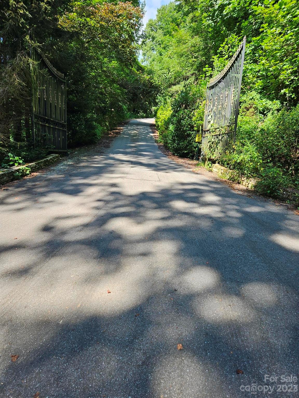 Lot located in gated community. Mountain Views. Year round access via paved roads. Located above the Maggie Valley Country Club.
