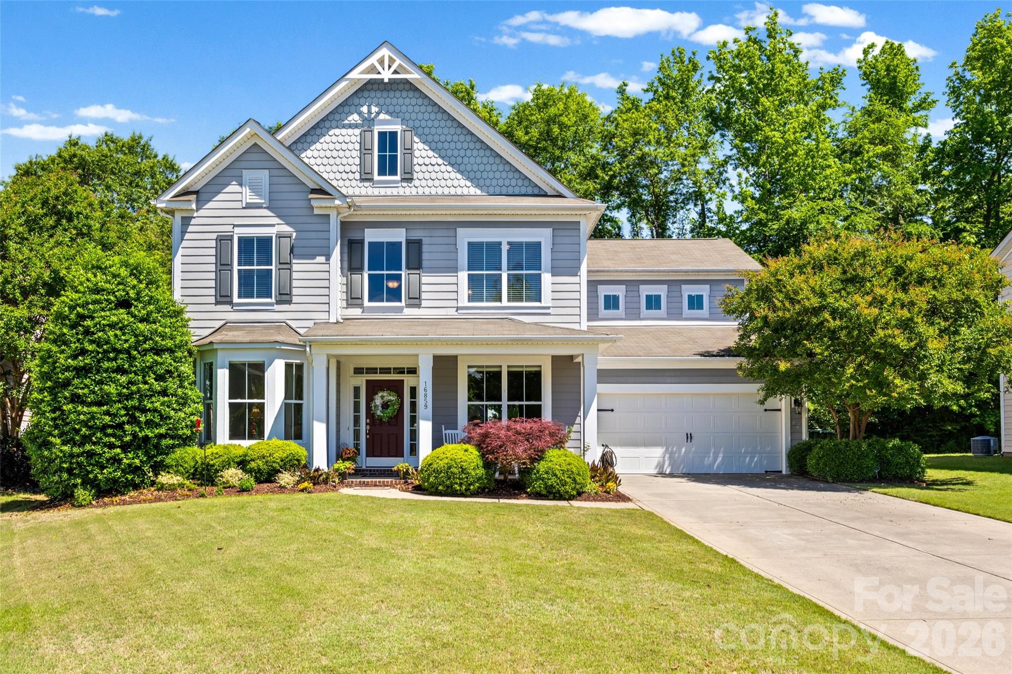 Welcome to this immaculate one-owner home located on a cul-de-sac lot in the highly sought-after amenity-rich community of The Palisades! From the moment you step into the stunning two-story foyer, you’ll appreciate the elegance and thoughtful design throughout. The main level features a formal sitting room, gorgeous dining room with a custom painted ceiling, and an open great room with a gas fireplace that flows seamlessly into the kitchen complete with granite countertops, stainless steel appliances, and a breakfast area—perfect for entertaining. A guest bedroom and full bath featuring a walk in shower on the main floor provide ideal flexibility for visitors or a home office. Don’t miss the extra storage tucked neatly under the stairs! Upstairs you’ll find a spacious primary suite with dual vanities, garden tub and separate shower and an oversized closet any fashion lover will appreciate, along with two additional bedrooms and a huge bonus room featuring surround sound.
Step outside and fall in love with the private outdoor retreat! Relax year-round on the screened-in porch featuring a ceiling fan for added comfort while overlooking the tranquil water fountain and beautifully landscaped backyard/garden area. Whether enjoying your morning coffee, hosting friends, or unwinding after a long day, this peaceful outdoor space offers the perfect blend of privacy and relaxation.