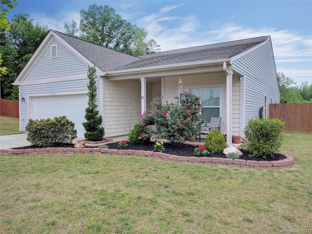 Looking for Fort Mill convenience, but with more room to spread out? Well, welcome home to Silver Run in popular Indian Land! Enjoy one level living with over 1600 sq ft and nearly 1/2 acre to call your own! Just a few miles down the road from the hustle and bustle of Fort Mill, you'll always be close to shopping and entertainment with an easy to commute to Charlotte too! Spend your summer entertaining on the patio or cool off and relax in the shade of the rocking chair porch. See it today!