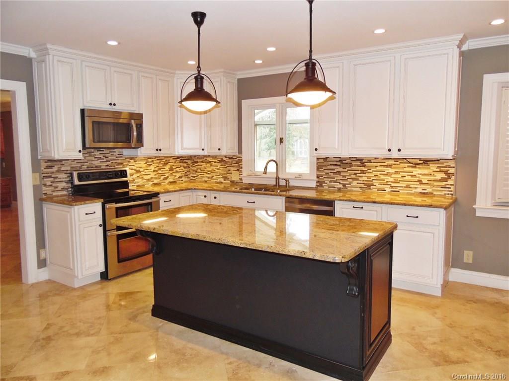 Simply stunning home in Fairlawn where every detail has been meticulously planned with quality, beauty, & comfortable living in mind. Enjoy the benefits of no city taxes, yet a perfectly positioned location with easy access to conveniences. High-end finishes, gourmet kitchen, master retreat with spa-like bath, formals, multiple fireplaces, built-ins, & a rec room. Entertain in all seasons from the enclosed sunroom or the custom paver patio with firepit. Impressive & inviting; ready to be yours!