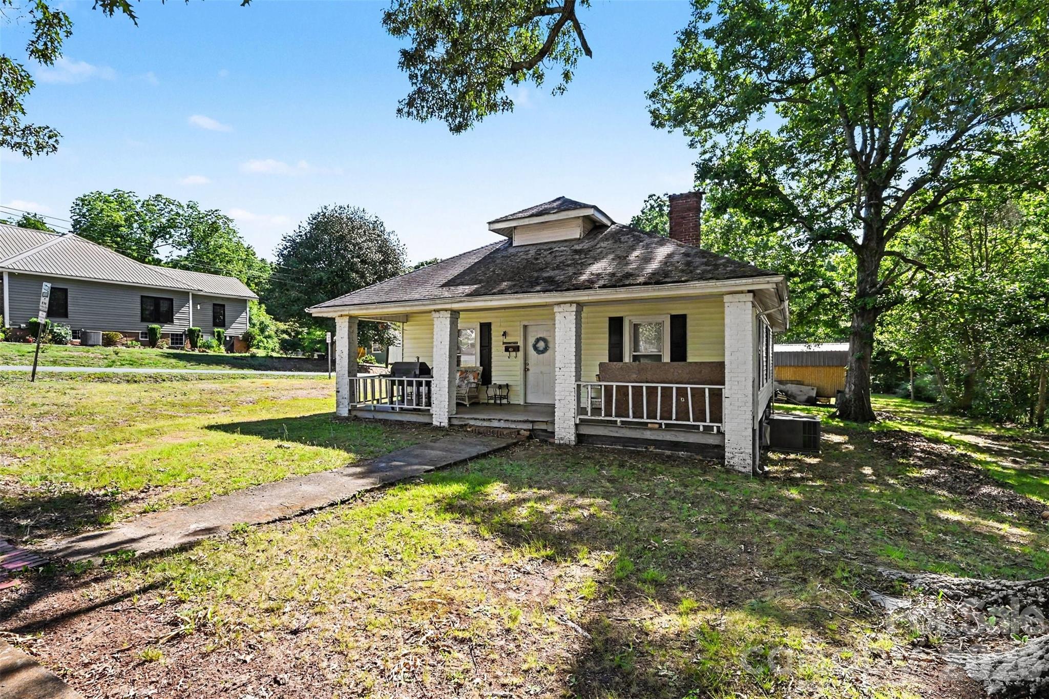 Investor special in the heart of Albemarle. Situated on a large corner lot with 0.39 acres, this property offers potential for renovation, rental income, or possible future redevelopment opportunities (buyer to verify subdivision/zoning possibilities with the City of Albemarle).

The home features over 1,100 square feet with 2 bedrooms, 1 bath, high ceilings, hardwood floors in some areas, a covered front porch, detached carport, and spacious backyard. Ideal opportunity for investors, flippers, or buyers looking for a project with upside potential.

Conveniently located just 1/2 mile to downtown Albemarle including local shopping, restaurants, and local parks. Property is currently tenant occupied on a month-to-month basis. Please do not disturb.

For interior photos, please reach out to co-list agent.