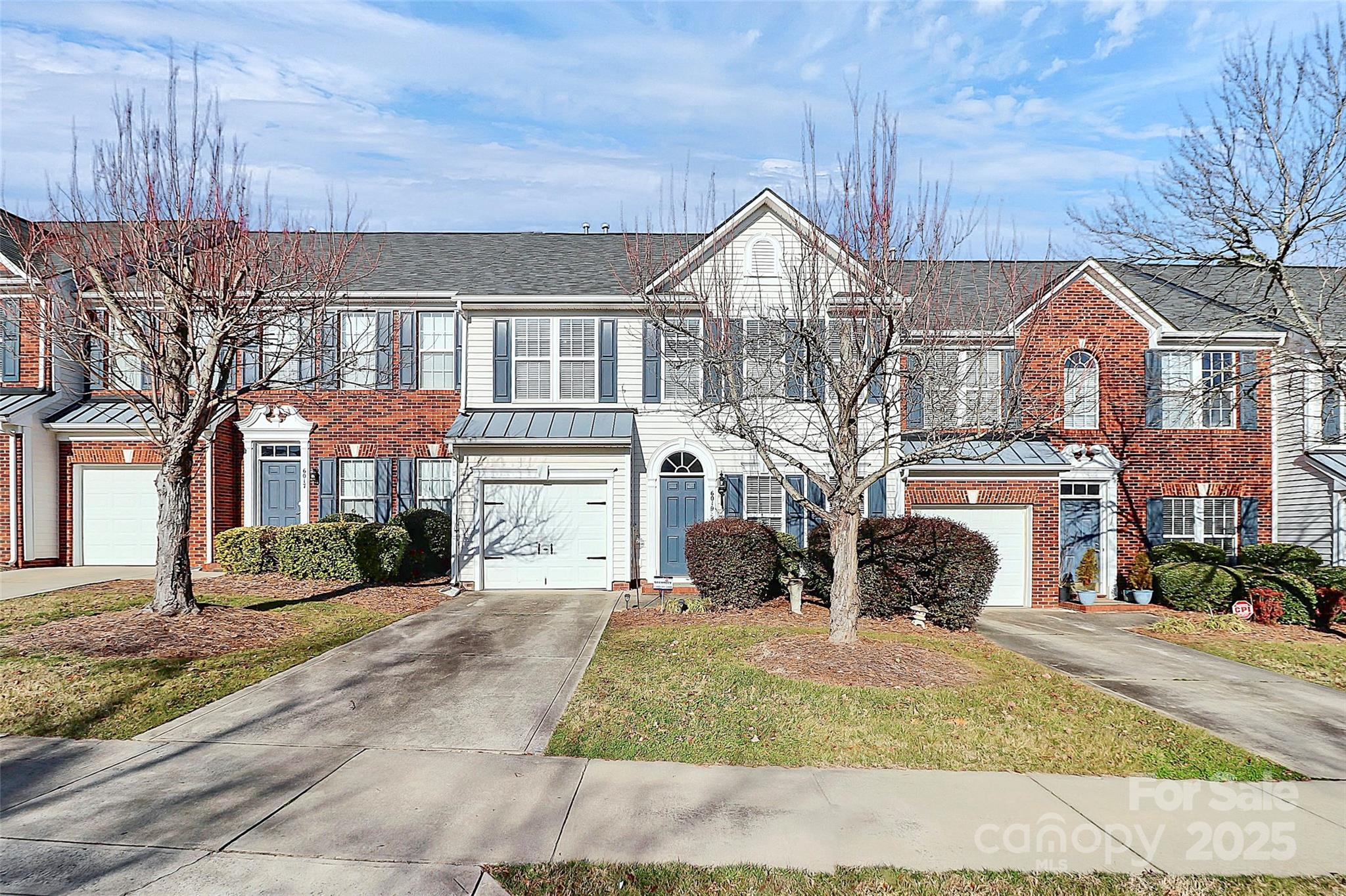MOVE IN IMMEDIATELY! Live in one of the most highly desired areas of Fort Mill. All of the comforts of Fort Mill life while being minutes away from shopping, restaurants, and entertainment. This home on an amazingly peaceful street will wow you! With gorgeous new flooring, including carpet and LVP, and new lighting. Upon entering, you will be greeted by a spacious formal dining room and open concept family room with gorgeous new flooring and a warm fireplace that invites relaxation. The kitchen is a dream come true with exotic quartz countertops, new stainless faucet, and a single bowl stainless steel sink. Complete with a cozy breakfast nook, it also features new all new appliances including an electric range, microwave, refrigerator, and garbage disposal. Upstairs you'll find three bedrooms with the primary featuring a cathedral ceiling, dual walk-in closets and a private bath with garden tub and shower. The entire home is freshly painted and ready for your furnishings. See it today!