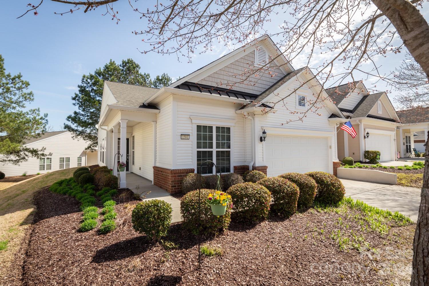 Throw away your lawnmower and tools, because maintenance and landscaping are included in the HOA! 
 Nestled in the heart of the highly sought-after Sun City, you will find this beautifully maintained end-unit patio home! This 55+ resort-style community offers a wealth of amenities, including a clubhouse, pool, and fitness center, and numerous social clubs!
Looking for a tranquil retreat where you can unwind while enjoying the fresh air and well-maintained landscape - you've got it with the screened-in porch! Need a spacious living area that seamlessly connects to the dining area and kitchen creating a warm and inviting atmosphere? Hello open floor-plan! What about 2 full bathrooms- one for each room? AND additional bonus flex space that offers endless possibilities, such as a cozy reading nook or home office? You guessed it- this home has got it!