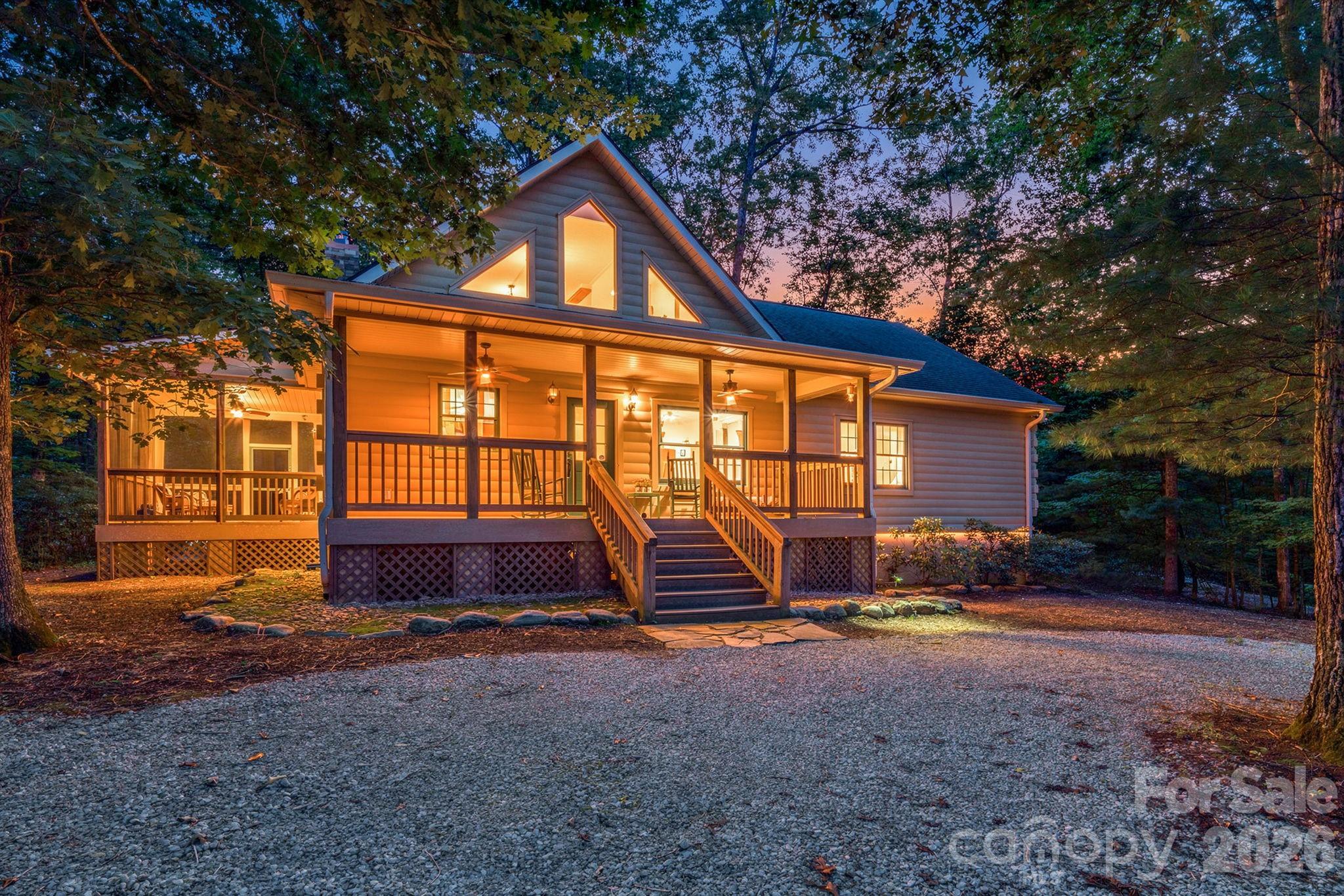 Looking for the perfect mountain retreat? Welcome to your home away from home in the gated community of Forest Heights, where privacy, security, and low-maintenance living come together in a beautiful mountain setting.
This charming and meticulously maintained 2-bedroom, 2-bath log cabin sits on approximately 1.5 private acres, offering the perfect blend of rustic character and modern comfort. Whether you're searching for a primary residence, vacation getaway, or investment property, this cabin is ready to exceed expectations.
Inside, you'll find a spacious open-concept layout featuring a beautiful kitchen with granite countertops, ample prep space, and seamless views of the dining and living areas—ideal for entertaining guests or enjoying cozy evenings by the fire.
Lovingly maintained by its original owners and used only occasionally as a vacation home, this property is exceptionally clean, well cared for, and truly move-in ready.
Outdoor living is just as inviting, with a welcoming front porch, a peaceful back deck, and a screened porch designed to showcase the natural beauty of the surrounding mountain landscape. Enjoy watching local wildlife and taking in the sights and sounds of nature from multiple outdoor gathering spaces.
Conveniently located just minutes from downtown Marion, NC, and within easy reach of outdoor destinations such as Lake James and Linville Falls, this property offers endless opportunities for recreation, relaxation, and adventure.
Tucked away behind the gates of Forest Heights, this hidden gem delivers the privacy, tranquility, and mountain charm you've been searching for. Your peaceful mountain getaway awaits.  View the 3D tour here: https://my.matterport.com/show/?m=jjXAenGuP2x&