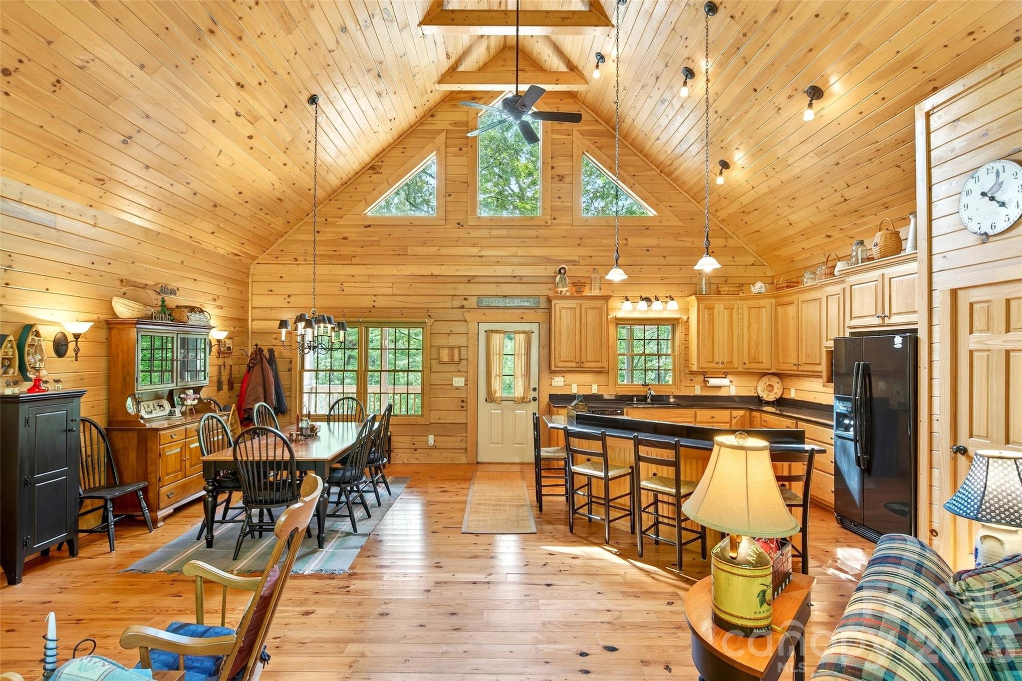 Looking for the perfect mountain retreat? Welcome to your home away from home in the gated community of Forest Heights, where privacy, security, and low-maintenance living come together in a beautiful mountain setting.
This charming and meticulously maintained 2-bedroom, 2-bath log cabin sits on approximately 1.5 private acres, offering the perfect blend of rustic character and modern comfort. Whether you're searching for a primary residence, vacation getaway, or investment property, this cabin is ready to exceed expectations.
Inside, you'll find a spacious open-concept layout featuring a beautiful kitchen with granite countertops, ample prep space, and seamless views of the dining and living areas—ideal for entertaining guests or enjoying cozy evenings by the fire.
Lovingly maintained by its original owners and used only occasionally as a vacation home, this property is exceptionally clean, well cared for, and truly move-in ready.
Outdoor living is just as inviting, with a welcoming front porch, a peaceful back deck, and a screened porch designed to showcase the natural beauty of the surrounding mountain landscape. Enjoy watching local wildlife and taking in the sights and sounds of nature from multiple outdoor gathering spaces.
Conveniently located just minutes from downtown Marion, NC, and within easy reach of outdoor destinations such as Lake James and Linville Falls, this property offers endless opportunities for recreation, relaxation, and adventure.
Tucked away behind the gates of Forest Heights, this hidden gem delivers the privacy, tranquility, and mountain charm you've been searching for. Your peaceful mountain getaway awaits.