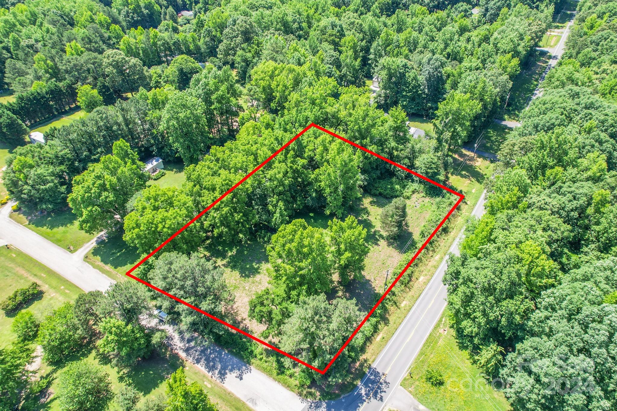 Nestled in the heart of York, this cleared over 1 acre residential land offers the perfect canvas for your new home Conveniently located near Hwy 55 and Hwy 49, this property combines the tranquility of rural living with the convenience of urban amenities. Whether you're looking to escape the hustle and bustle of city life or seeking a peaceful retreat to call your own, this property is for you!  There is already a septic installed, approved for a 3 bedroom home, and county water tap.