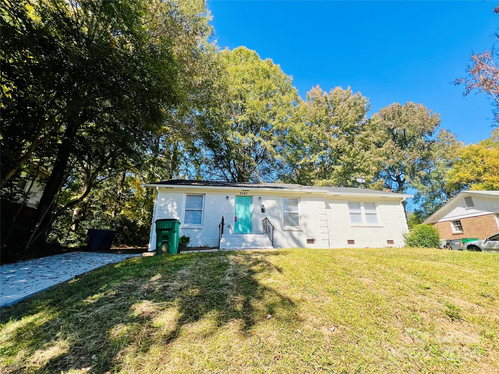 Don't miss out on this beautifully updated 3 bedroom, 2 bath home located minutes from I-85, University area and Uptown. With great curb appeal, this home offers plenty of comfortable living space as well as a nice size backyard, perfect for those family gatherings. Spacious living room. Kitchen that features updated appliances and plenty of cabinet space. Master bedroom features a private master bathroom with a stand-up shower and updated amenities. There are two additional bedrooms and another full bath also with updated amenities that adorn this cute home. Gorgeous new flooring throughout home.