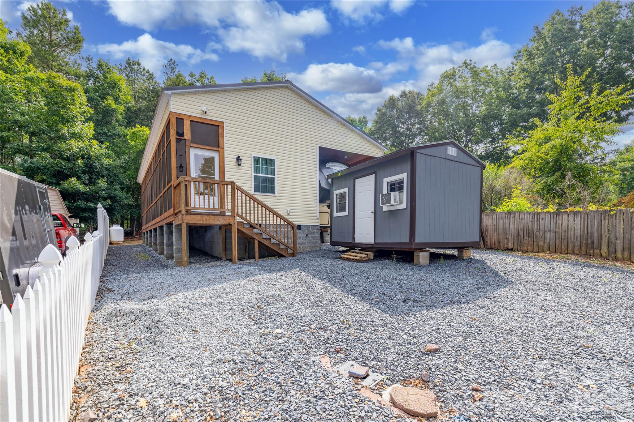 Welcome to your perfect lake retreat in the gated community of Twin Harbor on Lake Tillery! This beautifully maintained 3-bedroom, 3-bathroom home comes fully furnished and move-in ready, making it ideal as a full-time residence, vacation home, or investment property. Offering plenty of space for family and friends, this home sleeps up to 10 guests and features a covered screened porch, perfect for relaxing and enjoying the peaceful surroundings. The open backyard provides space for outdoor activities, and the property also includes a storage building with power for added convenience.
Twin Harbor offers exceptional amenities designed for lake living, including:
 *Community lake access for swimming and boating
 *Swimming pool
 *Recreational courts
 *Playgrounds
 *Arcade 
 *Golf cart-friendly, gated community 
Whether you're looking for a weekend getaway or a place to call home, this property is truly ready for you to start enjoying lake life from day one!