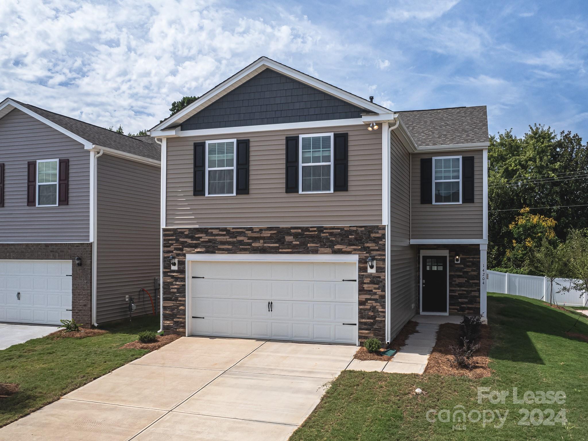 This spacious & modern two-story home is designed with open-concept living in mind. This home features four bedrooms, two & a half bathrooms & a two-car garage, making it perfect for your new home. Upon entering the home, you'll be greeted by an inviting foyer that leads directly into the heart of the home: the great room. This impressive space features a living room, dining area, and well-appointed kitchen. The kitchen is equipped with a pantry, stainless steel appliances, & a large island with a breakfast bar, making it perfect for both cooking and casual dining. The home also features a primary suite, complete with a large walk-in closet and ensuite bathroom featuring dual vanities and a spacious shower. The additional three bedrooms share a full bath that includes dual vanities. Outback is a patio, perfect for outdoor entertaining. With its thoughtful design, spacious layout, and modern conveniences.