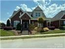 This custom-built home in Augusta Place is filled with upgrades and offers fabulous space for new owners.  The main level provides the primary bedroom, a second bedroom, two full baths, an office, family room and kitchen.  The open floor plan is perfect for entertaining with a spacious kitchen with grand island that overlooks the family room.  You will be impressed!  Upstairs is home to a third bedroom, full bath, and bonus room!  The sunroom and courtyard are perfect for outdoor living. Enjoy the attached double garage and all the benefits of living in this fabulous neighborhood!