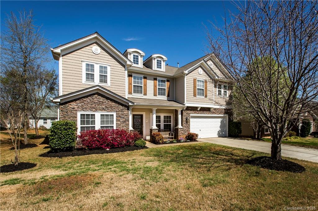JUST REDUCED! Spacious & open floor plan with Fort Mill schools & easy access to I-77 & Carolina Place Mall! Upgraded Kitchen includes 42" cabinets, solid-surface counters & stainless appl's. Formal LR & DR, open Den with gas logs/Kitchen/Breakfast rm with 18" ceramic tiling & media rm on main. Massive, master suite has an incredible bath with double vanities, garden tub/separate shower & huge walk-in closet. Three secondary BR's, laundry rm & large Bonus rm upstairs. Huge 25x14 stamped patio.