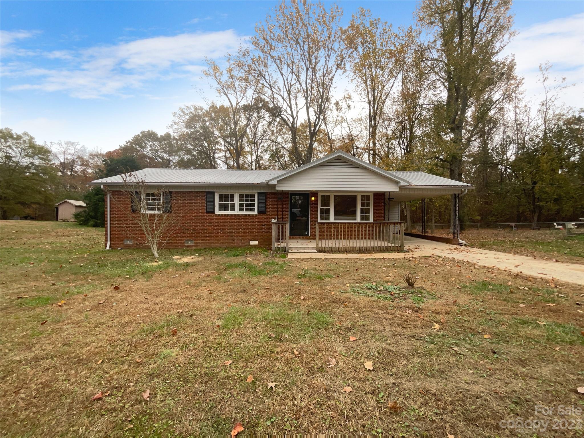Nearly all brick ranch on over 1/2 acre with hardwood and laminate flooring. Come see this home today!