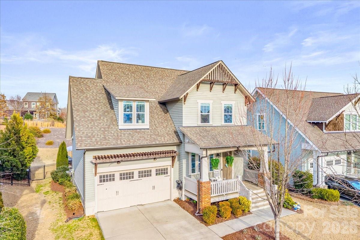 Welcome to this beautifully upgraded home in the highly desirable Masons Bend community of Fort Mill, built by award-winning Saussy Burbank. Masons Bend is one of Fort Mill’s most sought-after neighborhoods, offering a resort-style community pool, clubhouse & fitness center, walking trails & green spaces, as well as a playground & community events.

This spacious residence offers over 3,200 square feet of thoughtfully designed living space, featuring 5 bedrooms, 3.5 bathrooms, and two primary suites, including a rare main-level primary, perfect for multi-generational living or guests. Step outside to your own private backyard oasis with a saltwater in-ground pool and extended travertine patio, ideal for entertaining, relaxing, and enjoying Carolina summers. Inside, you’ll find hardwood floors throughout the main and second levels, custom finishes, and designer touches at every turn. The heart of the home is the stunning kitchen and custom butler’s pantry with floor-to-ceiling shelving, walnut countertops, and beverage fridge, offering both beauty and functionality. Additional highlights include a renovated office with built-ins, board-and-batten accents, upgraded lighting, and generous storage throughout.

Its prime Fort Mill location is just minutes from I-77, Charlotte, Ballantyne, and Uptown. This home provides easy access to top-rated Fort Mill schools, shopping & dining at Kingsley and Baxter Village, major employers, and Charlotte Douglas International Airport. Enjoy the benefits of South Carolina taxes with the convenience of nearby city living.