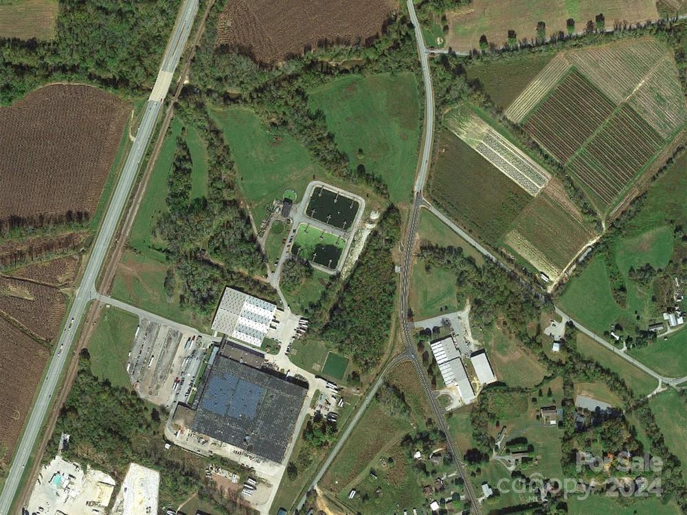 Manufacturing and warehouse site is the former Owen Manufacturing and Cranston Print Works Facility. Also known as NC Hwy 25, this section of Hendersonville Road in the Asheville metropolitan area is 1.6 miles north of I-26, and 1/2 mile south of the town of Fletcher.