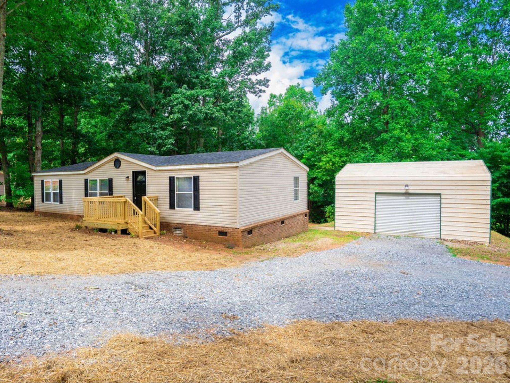Sitting on half an acre, this 3-bedroom, 2-bath home offers space inside and out. Fresh paint, new floors, and updated kitchen give the interior a clean, modern feel, while a brand new roof means one less thing to think about for years to come. The 22x22 attached garage is a standout feature, plenty of room for vehicles, storage, hobbies, or all three. If you've been waiting for move-in ready home with real outdoor space, take a look at this one.