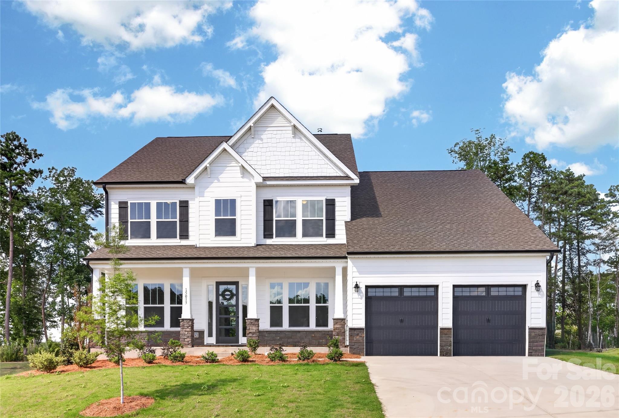 Discover the Kensington, a stunning semi-custom Quick Move-In home offering over 4,200 square feet of thoughtfully designed living space on a half-acre homesite with views of Fishing Creek Lake and a backyard setting overlooking a pond. Featuring 4 bedrooms and 3.5 baths, this home blends flexible spaces with elevated finishes throughout.

The main level showcases a private Study, formal Dining Room, and an expansive open-concept Great Room designed for everyday living and entertaining. The gourmet Kitchen is appointed with a dramatic quartz waterfall island, stainless steel appliances, non-vented canopy hood, and Butler’s Pantry, creating both style and functionality. Extend your living outdoors on the rear screened porch and enjoy the surrounding water views.

The spacious Primary Suite on the main level offers a spa-inspired bath featuring a garden tub, tiled shower, dual vanities, and dual walk-in closets. Upstairs, you’ll find additional bedrooms, two full baths, a large Game Room, and a versatile Bonus Room offering flexibility for work, recreation, or hobbies.

Located within the Edgewater Golf Course Community, residents enjoy access to community amenities including a pool, clubhouse, boat docks, and walking and biking trails. This exceptional Quick Move-In opportunity combines upgraded design, scenic surroundings, and everyday convenience.