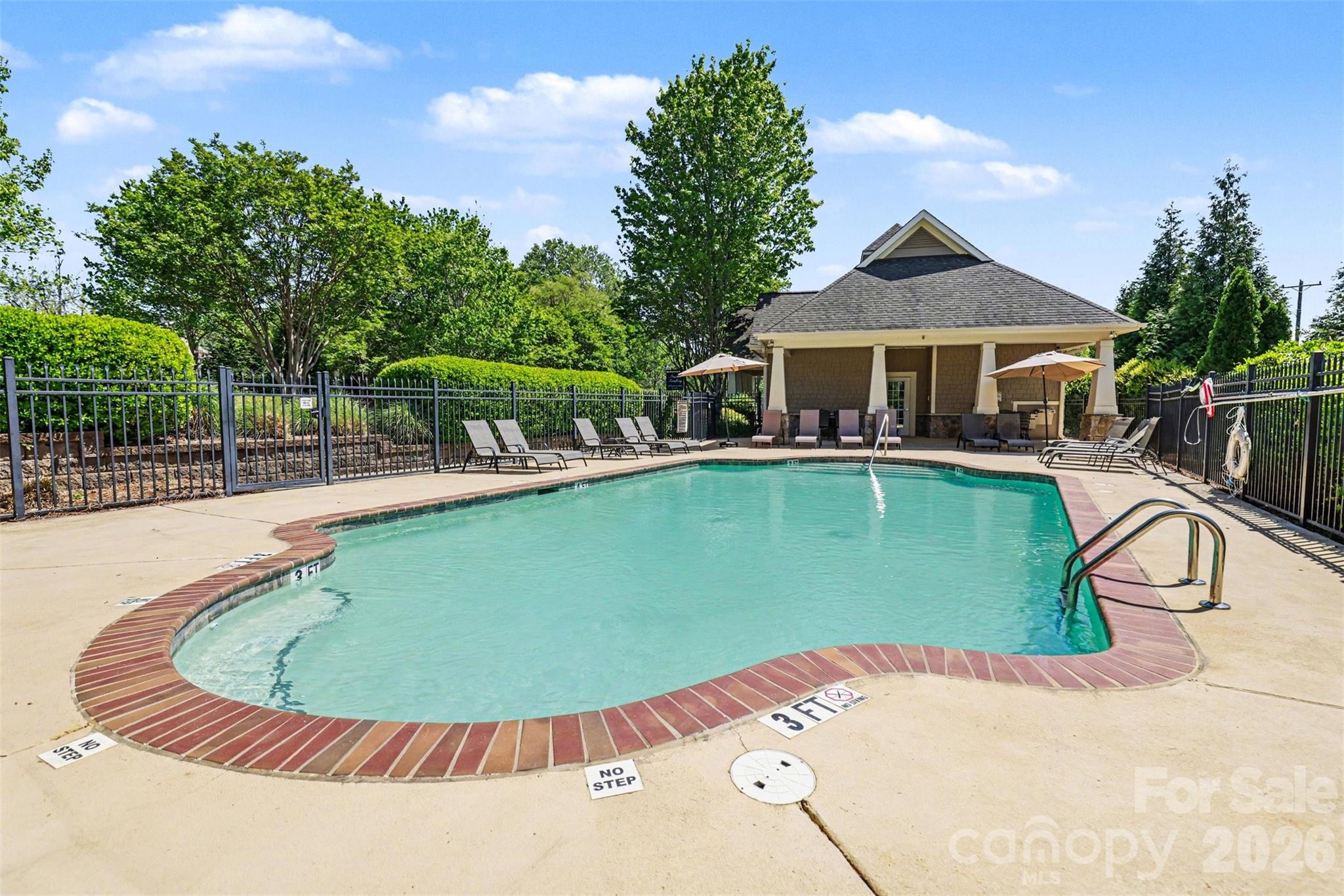 Make yourself at home in this thoughtfully designed townhome community located in the heart of charming Cramerton. This property features a bright and spacious open-concept lower level, perfect for seamless entertaining and comfortable daily living. The first floor was recently painted, minus half bath. The kitchen anchors the lower level with its expansive island, granite countertops and stainless-steel appliances including a brand-new stove. Microwave and dishwasher recently replaced in 2025. The living space extends beautifully to the outdoors. Step through to the private rear patio, where the included wood pergola stays, providing a shaded retreat for morning coffee. Residents love the clubhouse with fitness center, outdoor pool and exterior grounds maintenance. Beyond the home, you are minutes from several top attractions like Goat Island Park and Greenway, McAdenville with its popular holiday lights experience, the National Whitewater Center, Crowders Mountain State Park and Daniel Stowe Botanical Gardens. This location is convenient to I-85 and the Charlotte Douglas International Airport. Be sure to take note of the top-rated schools here. This home offers the perfect blend of modern comfort and active living in a prime location. You are welcome to park in the driveway or in the Cul-du-sac.