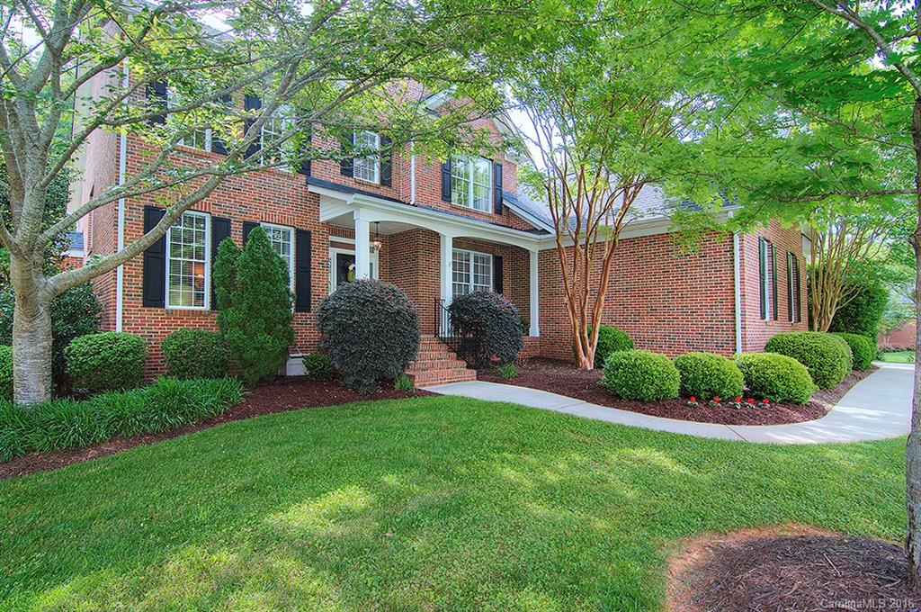 Spectacular 2 story home w/ bsmt on almost one acre wooded, private lot! The back yard is a lovely oasis with a covered patio, a patio in the woods & lots of beautiful mature vegetation! Lg windows in the 2 story GR allow for lots of natural light to fill this beautiful home.Spacious Master Suite; Kitchen w/ breakfast area & view of back yard; 3Br plus large rec/bonus/craft Rm/BR up. Finished rec rm+ full BA in bsmt w/ fp & gorgeous barn doors! Lots of flex space in unfin.bsmt area! A must see!