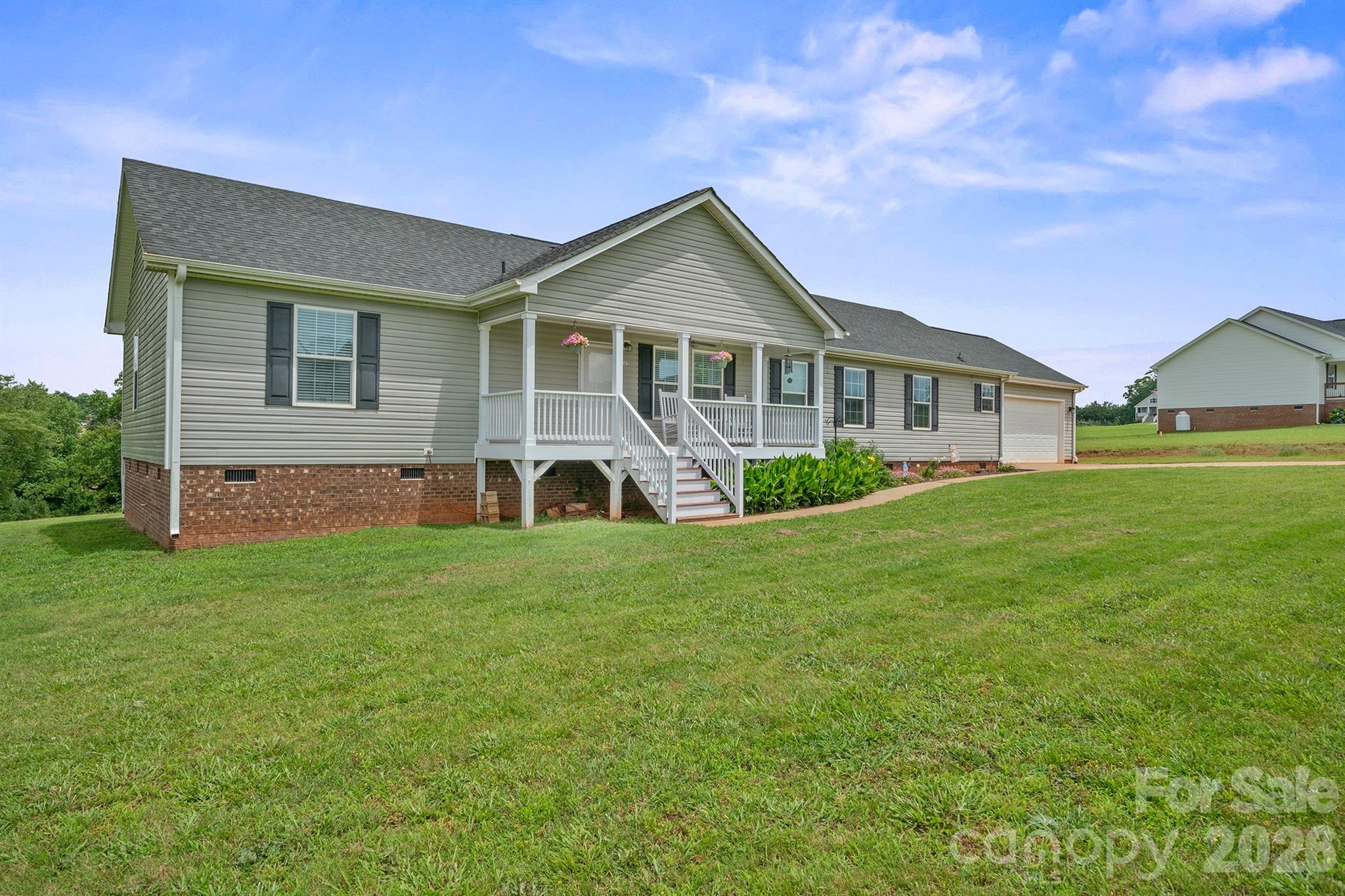 Welcome to this beautiful 4-bedroom, 2-bathroom + office home nestled on a generous and serene 2.36-acre lot in the lovely Baywood Heights subdivision. Enjoy your mornings or unwind in the evenings on the large covered front porch, a perfect spot for rocking chairs and enjoying nature. Step inside and discover an open-concept kitchen, complete with island, breakfast bar, and ample counter space—perfect for entertaining or everyday living. The spacious living and dining areas flow seamlessly from the kitchen, creating a warm and inviting atmosphere. Retreat to the primary suite, which features a private bathroom and ample closet space, while three additional bedrooms offer flexibility for a home office, gym, or guest rooms. The convenient 2-car garage provides plenty of space for parking and additional storage. With thoughtful updates and a peaceful location, this home is move-in ready and waiting for you!