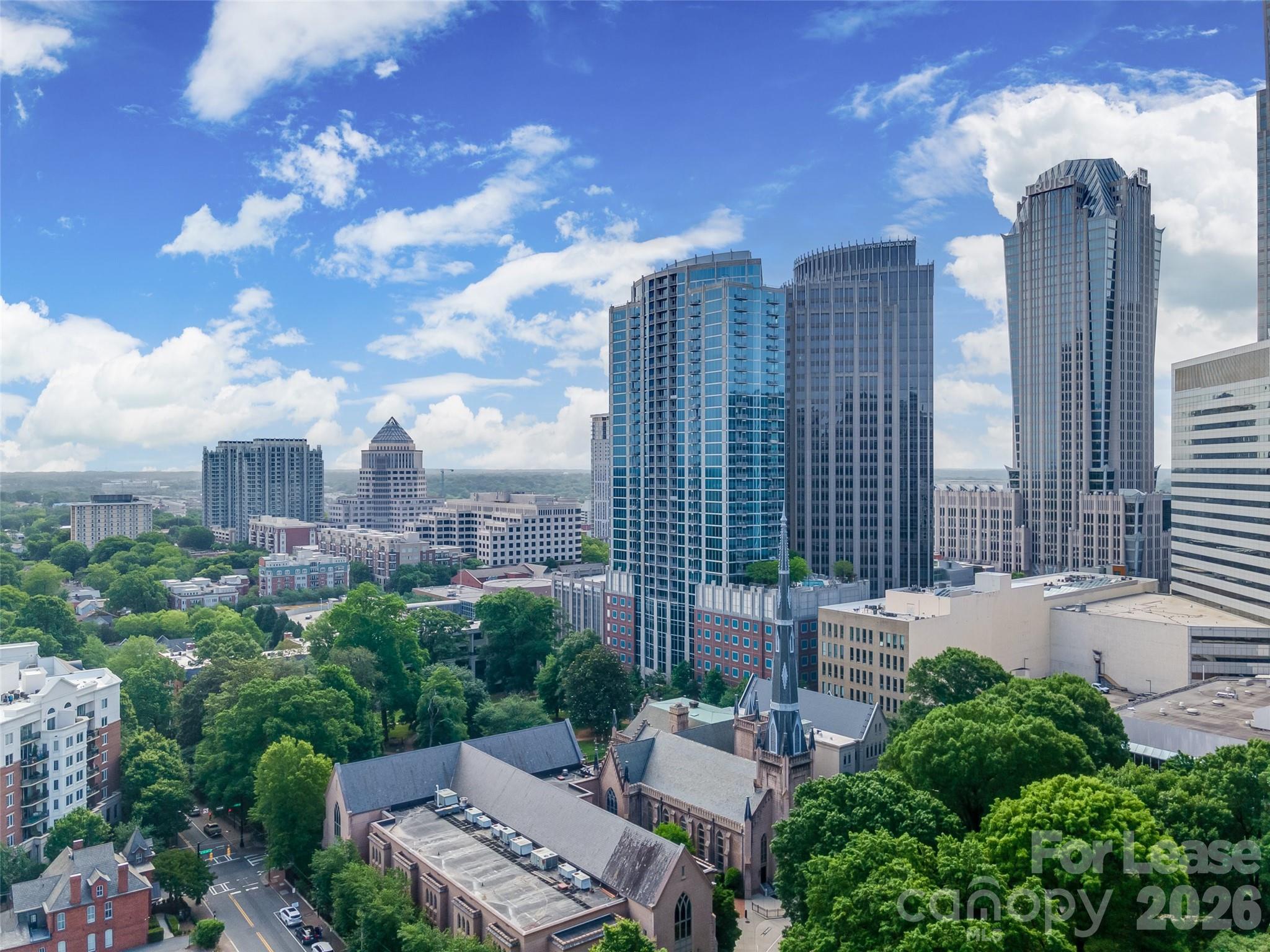 Celebrate the vibrant city life with a luxurious stay, where modern elegance meets unparalleled comfort. Located in Charlotte, NC, this stunning 2BR, 2BA condo offers an expansive 1,210 square feet of beautifully designed living space. Experience scenic views from every window, providing a picturesque backdrop to your daily routine. The open-concept layout seamlessly blends the living, dining, and kitchen areas, perfect for entertaining or simply enjoying a quiet evening at home. Each bedroom offers a serene retreat with ample space and privacy, while the full bathrooms boast sleek finishes. Step out onto your private balcony to soak up the skyline and feel the energy of the city below. This high-rise haven combines style and convenience with its close proximity to downtown attractions, dining, and entertainment. Elevate your lifestyle in this exquisite condo that promises both sophistication and comfort. Make this your urban sanctuary and experience the best of Charlotte living.