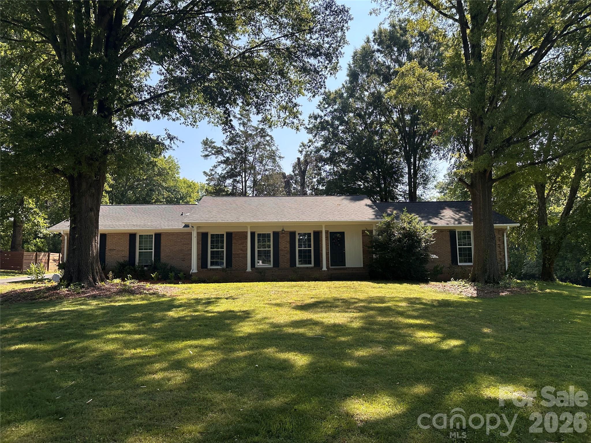 Solid brick home on approximately 2 acres in the 28227 area with great bones and strong renovation potential. County records show 3 bedrooms, 2 full bathrooms, and approximately 2,779 sqft. Property offers multiple living areas, bonus/flex spaces, a second kitchen, and a layout that may work well for multigenerational living, home office, or hobby space. Interior is dated and needs cosmetic updates, but the acreage, space, and flexibility make this a rare opportunity. Sold as-is. Buyer/buyer agent to verify all information important to buyer.