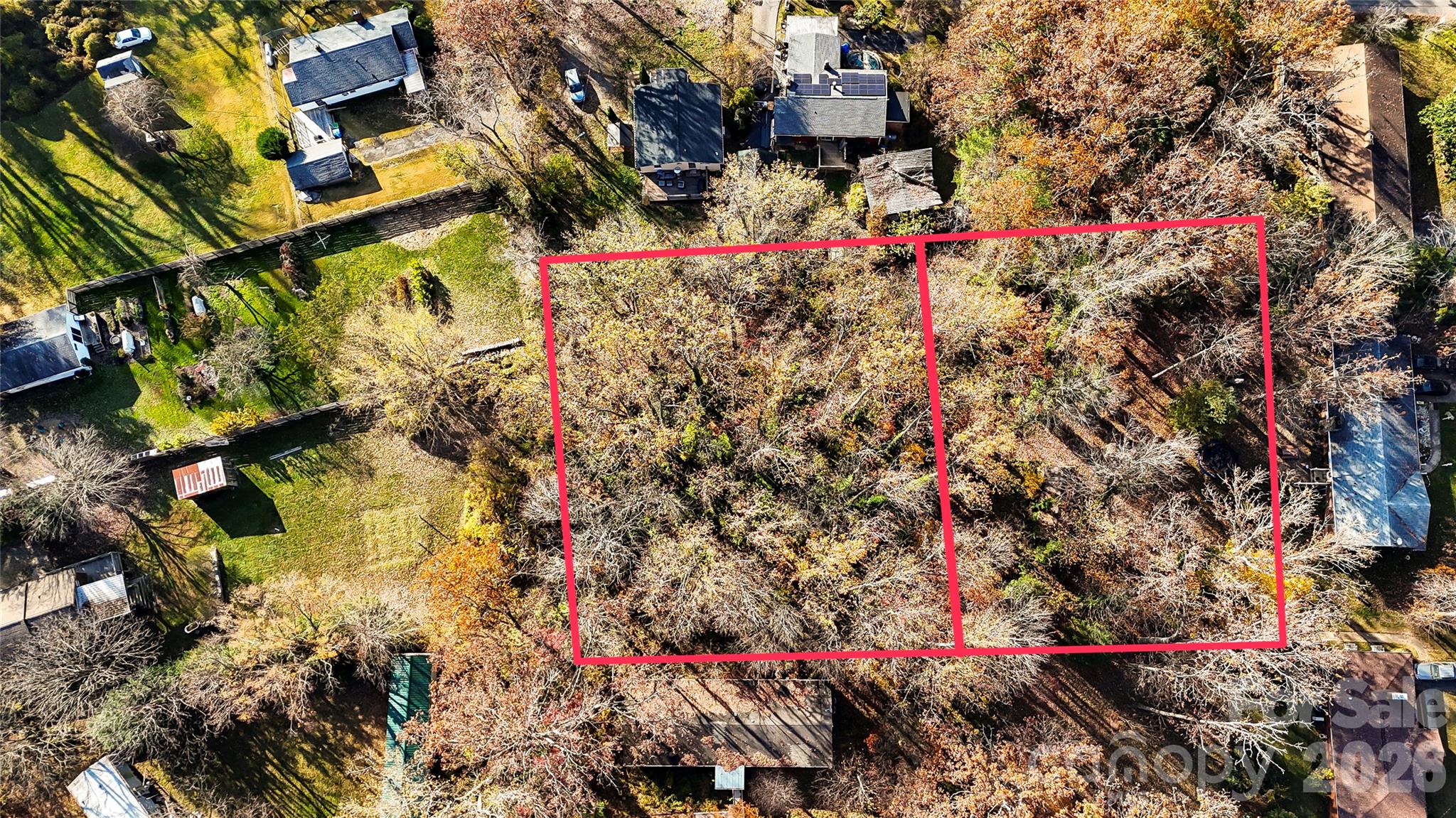 Two adjoining wooded lots previously subdivided being sold as a pair totaling 0.35 acres on Caribou Rd in a convenient Asheville location. Minutes from Downtown Asheville, Biltmore Estate and Village, and the Blue Ridge Parkway. Ideal for a future homesite or investment opportunity. Buyer to verify all development options with the City of Asheville.
