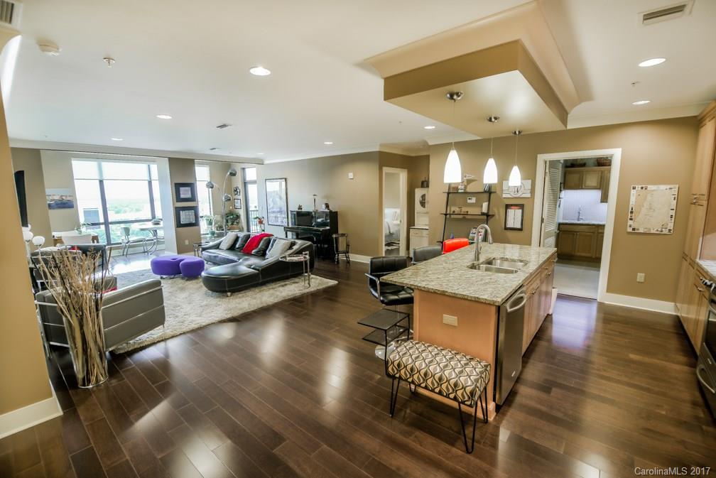 Amazing View from this 15th floor condo in the heart of Uptown. Split bedrooms,2 full baths, large living space perfect for entertaining. Walk-in custom bedroom closets,custom pantry and integrated audio/video system. Granite countertops, kitchen roll out shelves and stainless steel appliances. Rooftop restaurant & pool with panoramic views. Great amenities-Fitness, game,theater rooms also large kitchen/meeting space,24hour concierge. Climate controlled storage unit may be purchased separately.