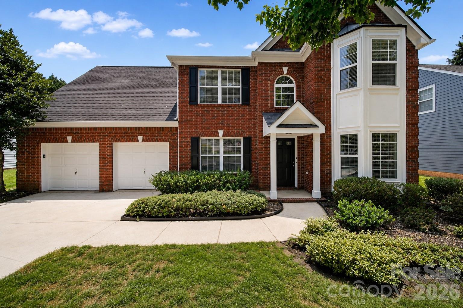 Welcome to this move-in ready home in the desirable Fox Glen community of Charlotte, featuring new fiber cement siding and energy-efficient HVAC system installed in 2025. Offering an open floor plan, hardwood floors, and new carpeting, this home is ready for its next owners. Spacious two-story family room is filled with natural light and features a cozy gas fireplace with brick surround. Kitchen includes newly painted cabinets, a gas range, pantry, tiled floors, and adjacent breakfast area. Dining room, flex room perfect for a home office, half bathroom, and laundry room complete the main level. Upstairs, the spacious primary suite has a tray ceiling, sitting area, walk-in closet, and en-suite bathroom with dual-sink vanity, separate shower, and soaking tub. Two additional bedrooms and a full bathroom complete the upper level. Step outside to enjoy the patio and private, tree-lined backyard that backs to HOA-owned property for added privacy. Water heater installed in 2024. Refrigerator, washer, and dryer convey. Attached two car garage, power-washed driveway, and professionally cleaned interior add to this home's appeal. Fox Glen residents enjoy a community pool, playground, and sidewalks, all while being conveniently located near I-485, I-85, UNC Charlotte, Uptown Charlotte, and Concord Mills.