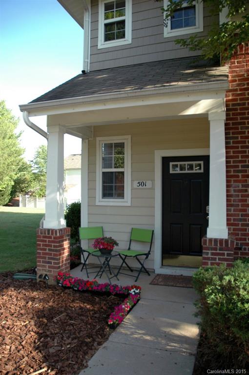 So many upgrades! Laminate flooring thru out the unit even on the stairs. Granite counters, tile backsplash, beautiful new vanities in all three bathrooms, Closet organizers in all three bedroom closets. Upgraded lighting, new sliding door with blinds in the glass. Nice common area green space next to this End Unit. Fresh newly painted. New AC-2012, Furnace-2013, Roof-2011.