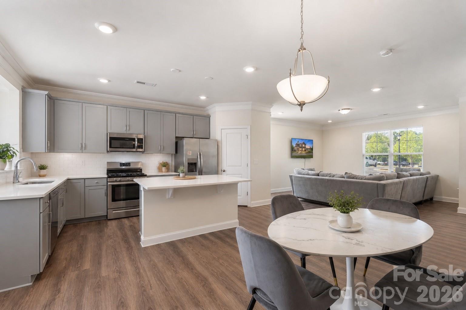 Discover the ultimate blend of modern luxury and effortless living at 2004 Blewett Drive. Built in 2021, this stunning 3-story townhome boasts over 2,200 sq. ft. of turn-key, energy-efficient space designed for how you live today.

What's Inside???
The Entertainer’s Main Level: A sleek, open-concept gourmet kitchen with upgraded hard-surface flooring that flows seamlessly into your living space—perfect for hosting Friday night drinks or Sunday brunch.

The Ultimate Flex Third Floor: An expansive top level ready to adapt to your lifestyle. Need an executive home office, private yoga studio, media room, or epic guest suite? The choice is yours.

The Location: Nestled in the heart of Prosperity Village (28269), you are seconds from I-77/I-485 and a quick drive to Uptown. Walk to local dining or enjoy nearby Davis Lake perks.

With a stabilizing market making this a incredibly smart investment, there’s no better time to secure this low-maintenance gem. Schedule your private tour today!