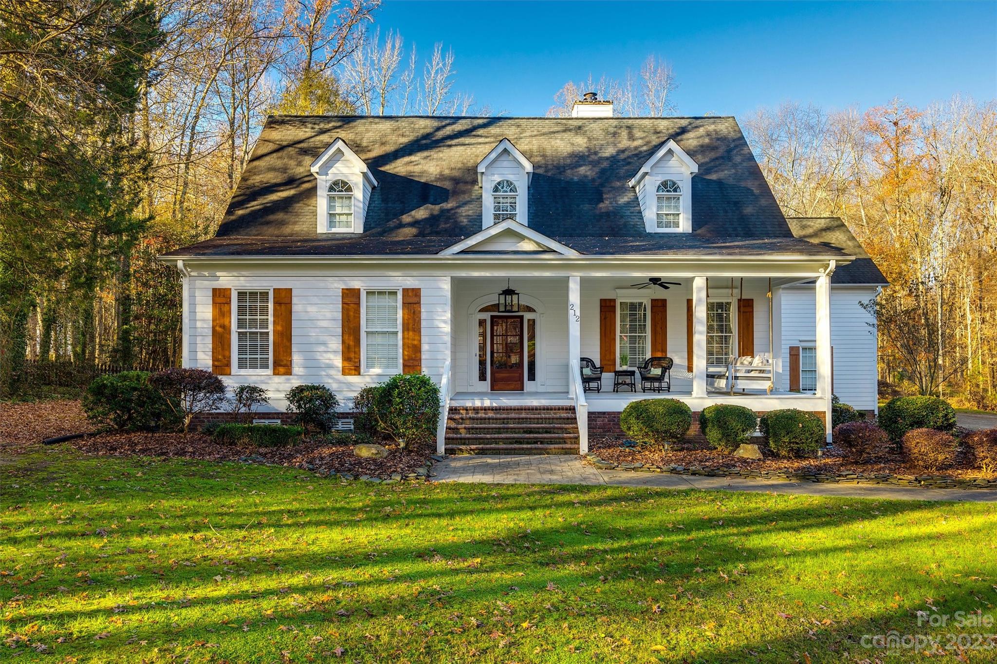 Welcome to this stunning custom-built French country home on 1.37 acres of private & spacious land. The great room features a coffered ceiling, a shimmering fireplace, & beautiful hardwood floors. The impressive kitchen boasts granite countertops, tiled backsplash, beaded board accents, stainless steel appliances, & large windows that flood the room w/ natural light. Through much of the home you'll find wood floors that add a touch of elegance & complement the 10' ceilings. The luxury primary suite on the main floor is like a resort offering a porcelain tub, tiled shower, & spacious walk-in closets. Upstairs, you'll find a bonus room, rec room, 3 bedrooms, & 2 full bathrooms. The outdoor living space is a true gem with a covered lanai w/ a gas fireplace & outdoor kitchen overlooking the massive backyard & perfect for entertaining. With an oversized garage and top-rated schools, this home has it all! You really must see it in person to fully appreciate all its beauty and charm!