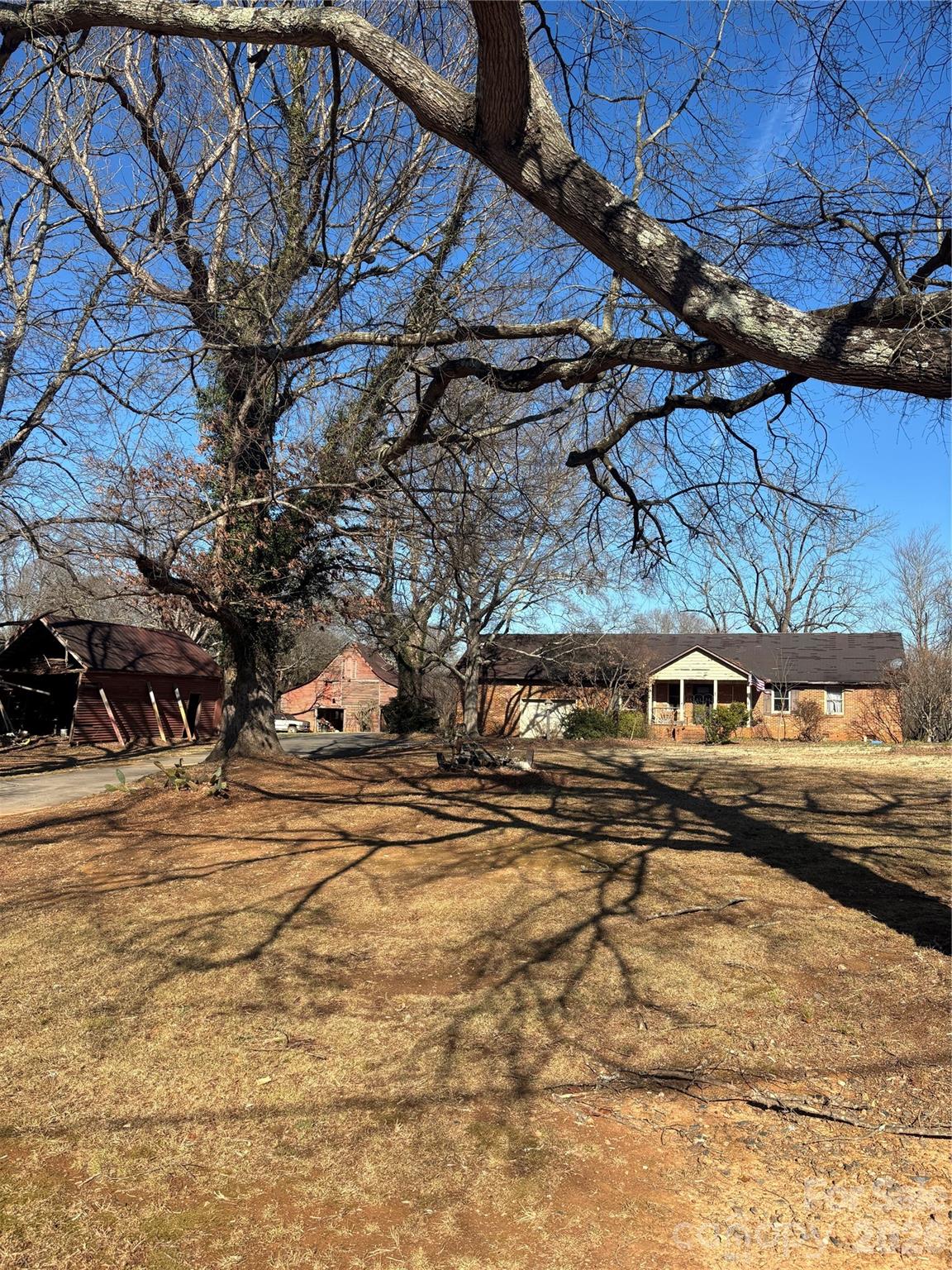 28.77-acre assemblage consisting of three parcels and one residential property being sold, "as-is." Property is currently zoned Residential (R-20) in Union County. Buyer to verify zoning, sewer and water connectivity, permitted uses, density, subdivision potential, utility availability, and all development requirements with Union County and applicable authorities. Located approximately two miles from US-74 and less than ten minutes from I-485, with proximity to existing residential communities and nearby retail, services, and amenities. Portions of the property include natural water features. No representations or warranties are made regarding future development, rezoning, or approvals. Listing information deemed reliable but not guaranteed.