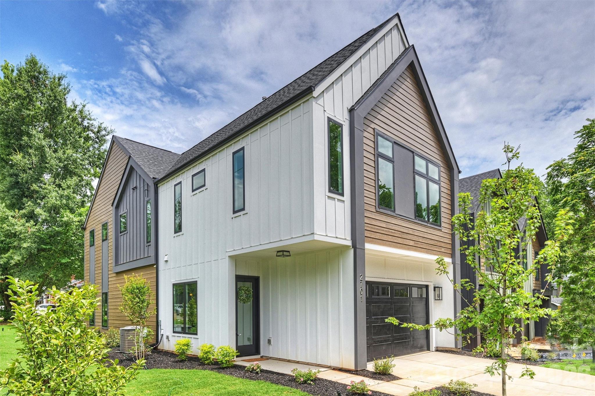 Modern New Construction perfectly situated in a high-growth Charlotte location, this gem offers an unbeatable lifestyle just minutes from Uptown, NoDa, and the vibrant dining scene at Optimist Hall.

Step inside to a thoughtfully designed, sun-drenched floor plan where seamless open-concept living meets sleek modern finishes. The heart of the home is the kitchen, boasting stainless steel appliances, crisp contemporary styling, and an oversized entertaining island perfect for hosting friends and family.

Retreat upstairs to the private primary suite—a true sanctuary flooded with natural light, featuring a spa-inspired luxury wet room and an expansive walk-in closet. Additionally, there are 3 bedrooms, a full bath, laundry and loft landing to enjoy and complete the upper level.  Outside, the backyard provides a versatile canvas for outdoor entertaining, gardening, or just a chance to unwind. 

With its modern design, premier location, and unmatched builder quality, this property represents an incredible opportunity to own a brand-new home at an exceptional value. Why wait for tomorrow? Schedule your private tour today and make this home yours!