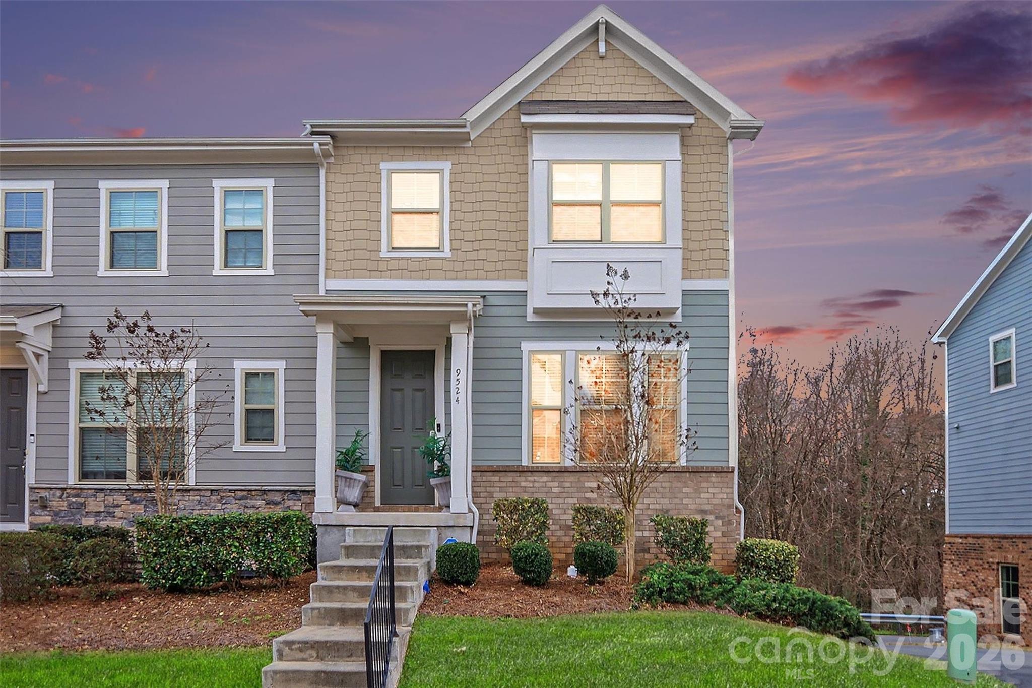 Rare end-unit townhome backing to trees for added privacy and a peaceful setting. Practically new, this 4 BR, 3.5 BA home features a bright open layout with engineered hardwoods throughout the main level. The kitchen stands out with beautiful quartz countertops, gray cabinetry, a large island, subway tile backsplash, gas stove with double oven, and plenty of space for cooking and gathering.

A guest suite with full bath is located on the entry level near the garage—ideal for visitors, a home office, or flexible living space. Upstairs, the stunning primary suite features marbled tile floors, a walk-in shower, and dual vanity sinks. Two additional bedrooms share a full bath.

The home also includes a rear-facing 2-car garage and an amazing location convenient to the light rail, airport, Uptown, shopping, restaurants, and medical facilities. Community amenities include a pool, cabana, and grilling area located nearby, while the HOA covers lawn maintenance and trash for easy living. Schedule your showing today!