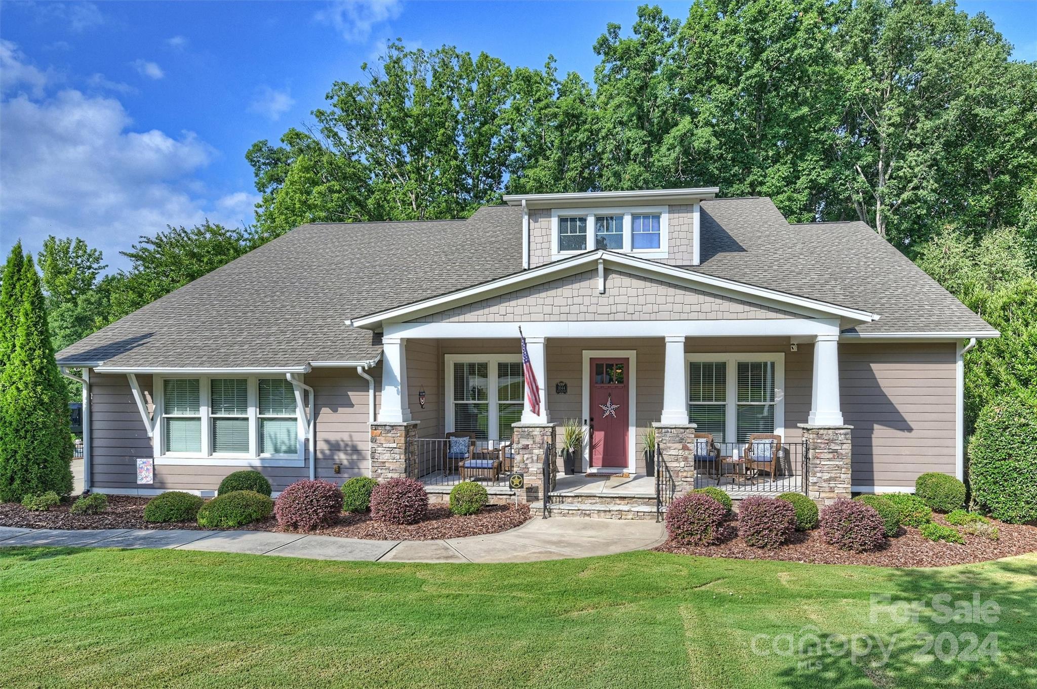 Don't miss this beautifully cared for 4 Bedroom 5 Bath Southern Beauty in the highly sought after Springfield community.  Home sits on a spacious lot backing to trees and the golf course.  Main floor features an Open Floor Plan with Large Kitchen Island, An Office, 4 Bedrooms and 4 Full Baths, Drop Zone and Laundry.  Beautiful 10 foot ceilings on the main with beautiful moldings and trim throughout. Upstairs features a Large Loft/Bonus Room with a Full Bathroom and Walk In Attic convenient for Storage.  This home is an entertainers dream with a Rocking Chair Front Porch and Private Screened Porch overlooking the gorgeous wooded backyard. Amenities galore including Pool, Clubhouse, Playground, Tennis Courts, Pickle ball Courts, Pavilion, and Walking Trails. Don't miss out on this move in ready home!