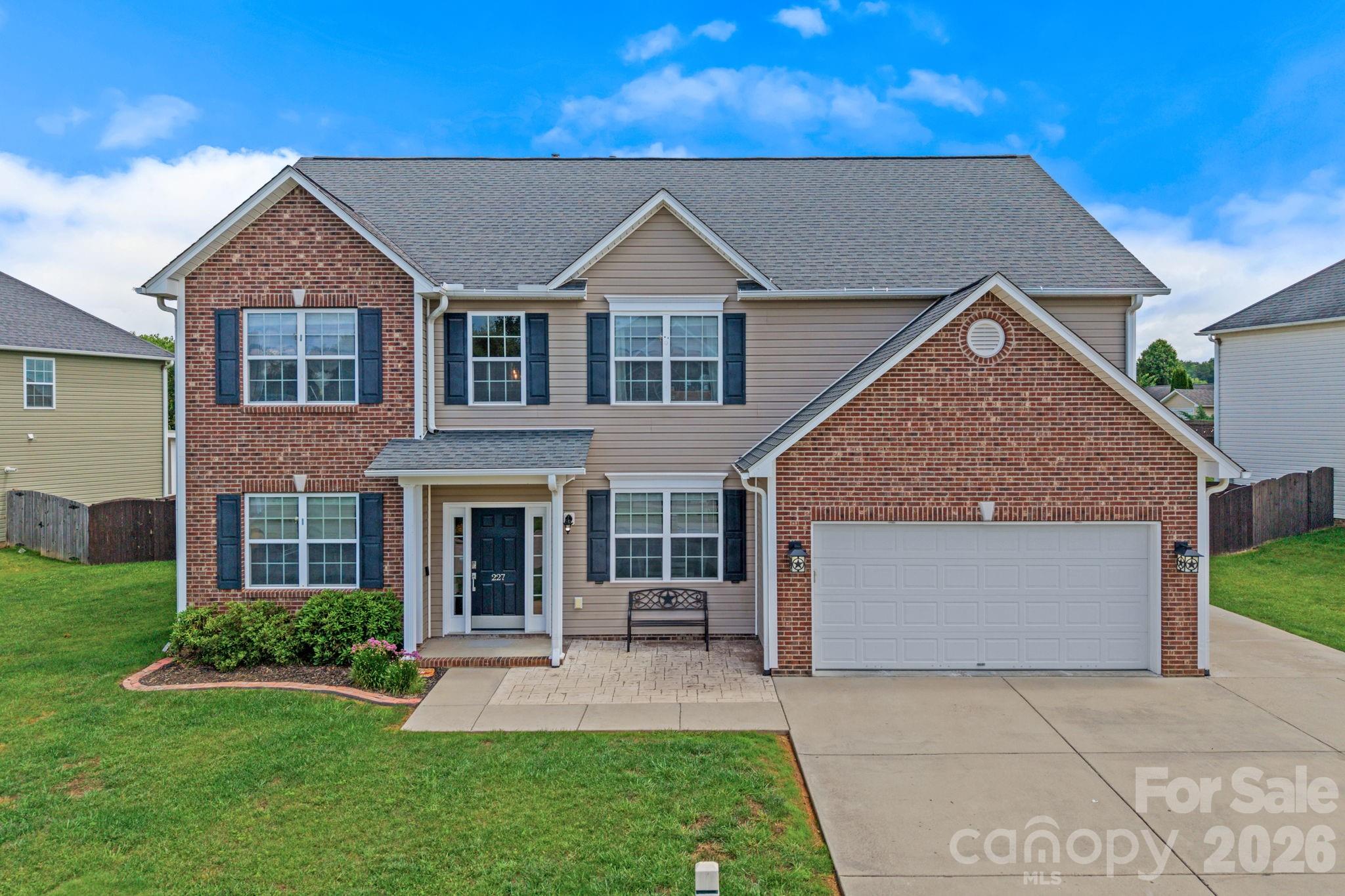Located within the highly sought-after River Stone community, this exceptional home offers more than 3,000 square feet of comfortable, light-filled living space and an outdoor setting designed to be enjoyed season after season. A soaring two-story foyer creates a memorable welcome, opening to generous gathering spaces that strike a wonderful balance between openness and warmth. Thoughtfully designed for both entertaining and everyday living, the floor plan offers multiple bonus spaces with remarkable flexibility, while the kitchen and fireside living room naturally become the heart of the home. Four spacious bedrooms and 2.5 baths provide plenty of room to spread out and settle in.

Step outside and discover one of the property's most remarkable features. Beyond the covered patio, a massive privacy-fenced backyard offers an exceptional amount of space to relax, entertain, and play. Whether hosting summer cookouts, enjoying backyard games, or gathering around the custom fire pit on cool evenings, this outdoor space is every bit as inviting as the home itself.

All of this is complemented by the exceptional lifestyle River Stone is known for, with amenities including a community pool, playground, recreational areas, and vibrant neighborhood events and activities. Convenient to both Asheville and Hendersonville, this home offers a wonderful balance of space, community, and location.