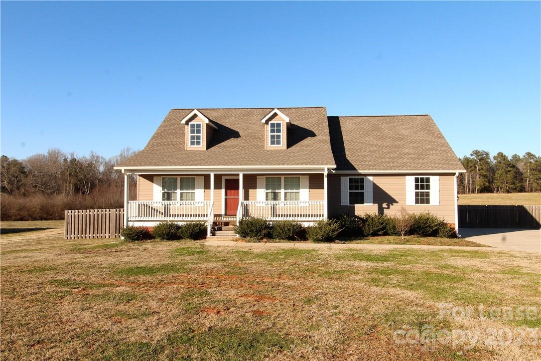 Like New Vinyl Sided Ranch Style Home-Split Bedroom Plan-3 Bedrooms & 2 Full Baths-1623 Heated SQFT-Spacious Vaulted Ceiling Great Room-Open kitchen with dining area overlooking rear covered porch-Kitchen has electric range oven, microwave hood, dishwasher, & refrigerator. Laundry room-Primary Suite with walk-in closet-Full primary bath with double sink vanity, garden tub/shower combination, small linen closet. Two additional nice sized bedrooms with full bath-Attached 2 Car Garage with Garage Door Openers & Keypad Entry-Rear Fenced Yard/Some Privacy Fencing-2.392 Acre-No Pets-No Smoking-One Months Rent Security Deposit-One Year Lease Minimum-Subject to Credit Check & Housing Background Check.