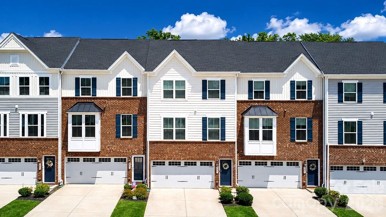 This stunning three-level townhome boasts 3 bedrooms and 2.5 bathrooms, 2 car attached garage, with a deck that offers a perfect spot for relaxation making it the ideal living space for those who love to entertain! On the main floor you'll find a spacious living area with modern vinyl plank floors that flow throughout the home. The white quartz counters adds a touch of elegance and is perfect for preparing meals. The kitchen also features stainless-steel appliances and plenty of cabinets for storage. The bedrooms are located on the upper levels of the home, providing a peaceful retreat from the main living area. Never venture far from home with easy access to nearby shopping, restaurants, and entertainment options. Come and see this beautiful property today and make it your own!
