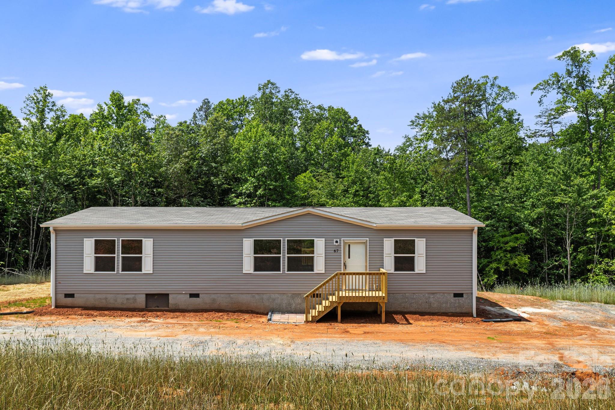 Come home to brand new construction in Nebo, just minutes to Lake James and 40 minutes to Asheville and convenient to Marion and Old Fort.  This three-bed, two-bath home is ready to move in and make it your own.  The open floor plan has a beautiful kitchen ready for entertaining friends and family.  Huge kitchen island is a chef's delight.  The laundry room is just off the kitchen.  Huge primary bedroom, bathroom, and walk-in closet.  Split bedroom plan with two guest bedrooms on the opposite side of the home.  Gently sloping and flat cleared front yard and back yard has buffer of trees and offers a private wooded setting.  Schedule your showing today and make Nebo your new home!