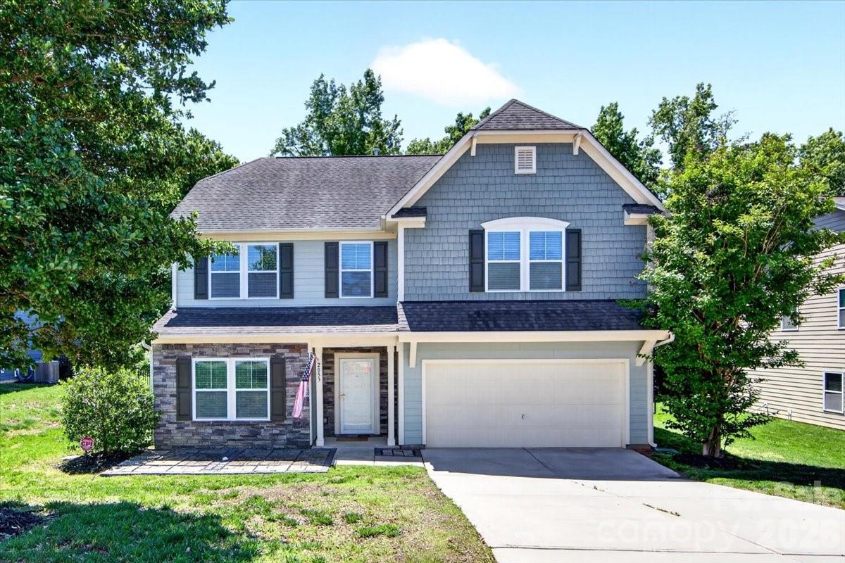 Welcome to 2053 Pine Siskin Court, a beautifully maintained home nestled in the highly sought-after Fox Ridge community of Indian Land. Located on a friendly cul-de-sac and just minutes from shopping, dining, and everyday conveniences, this home offers the perfect blend of comfort, style, and location.

Step inside to discover a bright and spacious open floorplan filled with natural light and designed for effortless living and entertaining. The heart of the home is the stunning chef’s kitchen, featuring granite countertops, a gas cooktop, stainless steel appliances, marble backsplash, crisp white cabinetry, a butler’s pantry, and an oversized island perfect for gathering with family and friends. The kitchen flows seamlessly into the great room, creating an inviting space ideal for entertaining or relaxing at home.

After a long day, unwind on the back patio overlooking mature trees and peaceful natural surroundings, your own private outdoor retreat.

Upstairs, the spacious primary suite offers a relaxing escape with a spa-inspired bathroom and a large walk-in closet. Thoughtfully separated from the additional three bedrooms by a versatile loft area, the layout provides both privacy and flexibility. The loft makes an excellent home office, media space, or play area.


Conveniently located near the popular RedStone shopping and dining district at Highway 521 and Highway 160, this home also offers quick access to Ballantyne, Fort Mill, and I-485 for an easy commute.

With its desirable location, functional layout, and stylish finishes, 2053 Pine Siskin Court is a home you won’t want to miss. Schedule your private showing today!