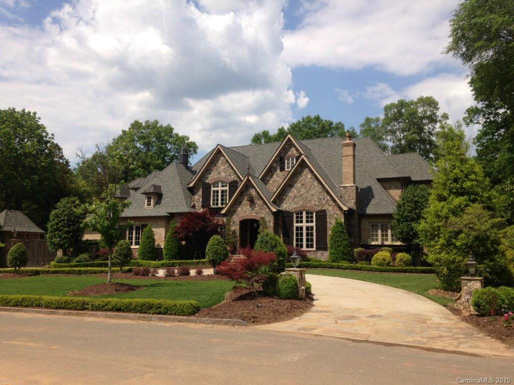 Distinctive architecture, luxurious appointments, rare & exceptional opportunity in SP’s Carmel CC community.  Elegant formal & informal spaces accentuated w/ Am. walnut flooring & ceiling inlays, expansive kitchen features  prof. grade appliances incl. warming & refrigerated drawers.  Opulent attributes: workout rm, vaulted ceilings, theater w/automatic draperies, remote controlled screened porch, heated matched-seam marble floors in all baths, his/hers mstr closets w/intense security features,