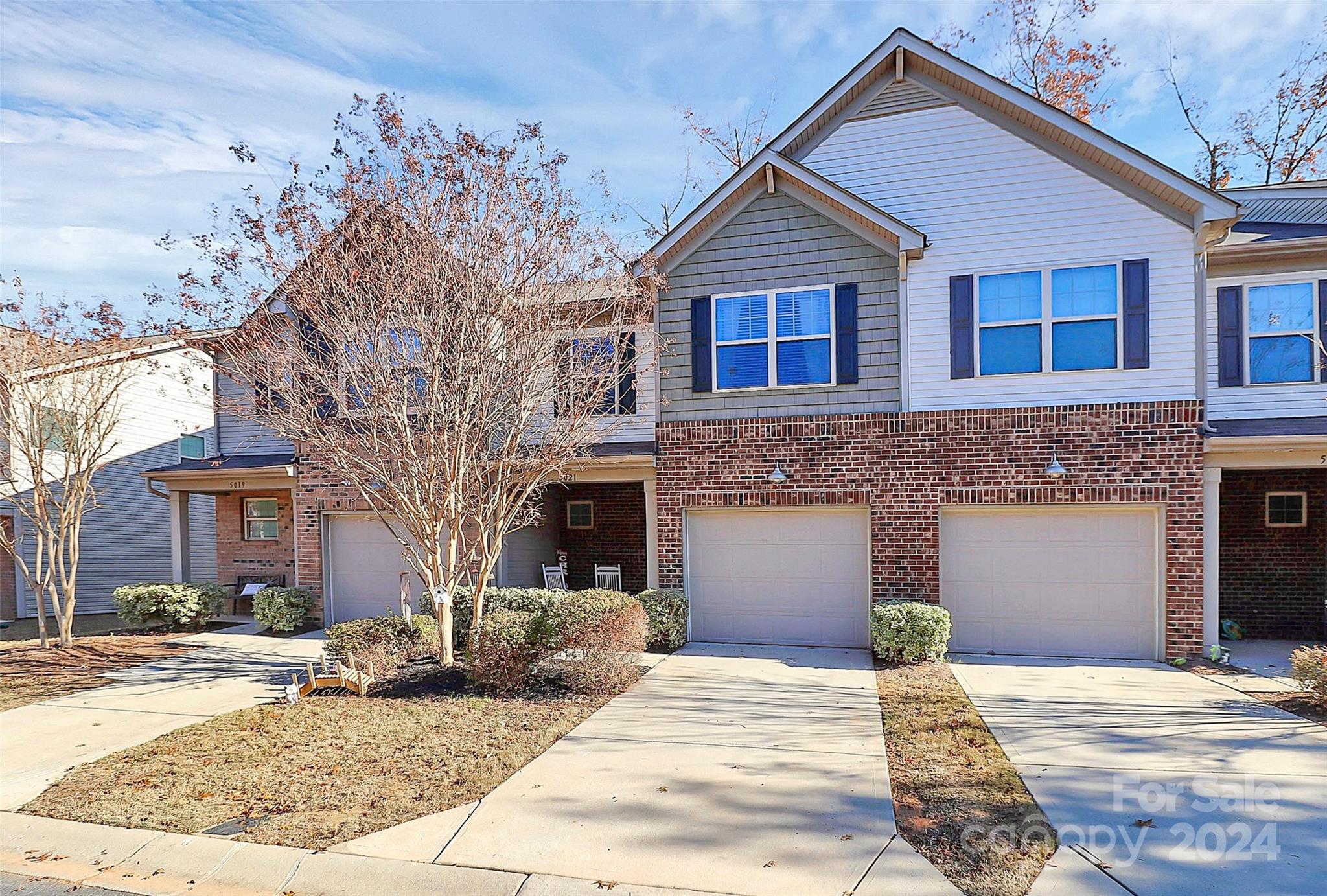 Beautiful Townhome UPDATED & Ready for you in THE GROVE! Surrounded by Shopping & Restaurant's, this is the Perfect place to call home! Walk onto BRAND NEW Designer LVP Flooring throughout the main living area. Kitchen is AWESOME w/42" Cabinets, Granite Counter-tops, HUGE Corner Pantry, GAS Stove, SS Appls, Breakfast Bar Seating. OPEN Floorplan is perfect for entertaining the Entire Family! Dining area is big enough to sit 6-8 people comfortably.  HUGE Great Room w/Gas Fireplace! UP: Brand NEW Carpet has been installed just for you! All Bedrooms are upstairs. 2 Guest Bedrooms w/Ceiling Fans & Standard Closets. Guest bathroom is nice with tub/shower combo.  Primary Bedroom is HUGE with Fan & OVER-SIZED Walk-in closet is perfect for all your items. Luxury Primary Bath w/Dual Vanity, Garden Tub & Custom Tile walk-in shower. Outdoors is perfect w/ Covered Porches at the Front Entry & Rear Screen Porch. This townhome backs up to private Trees. HOA covers: Amenities & Exterior Landscaping.