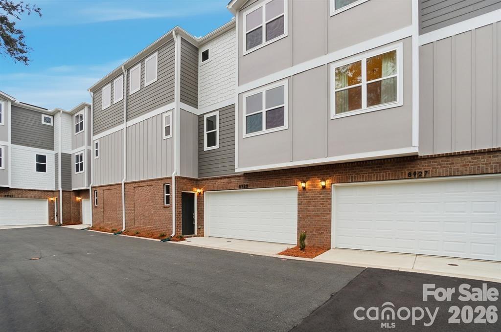 SELLER OFFERING $4,000 TOWARD BUYER CLOSING COSTS! > NEW CONSTRUCTION > Discover the perfect balance of luxury and logic in this brand-new 4-bedroom, 4-bathroom townhome located in the heart of South Charlotte. This isn’t your standard townhome layout; it is a masterclass in functional design.

MAIN LEVEL: Features a spacious two-car garage and a private bedroom with a full bath—perfect for a quiet home office or a secluded guest retreat.

SECOND LEVEL: The heart of the home. This bright, open-concept level is anchored by a chef-inspired kitchen and a sun-drenched living area. Uniquely, this level includes a FULL BEDROOM AND FULL BATH, offering rare convenience for guests or multi-generational living without the need to change floors.

THIRD LEVEL: The ultimate sanctuary. The primary suite features a spa-inspired bath with a custom shower and a massive walk-in closet. A fourth bedroom with its own en-suite bath completes this level, ensuring every resident enjoys total privacy.

LOCATION: Just minutes from the Light Rail, I-485, and Little Sugar Creek Greenway. Enjoy the best of South Charlotte shopping at Quail Corners and Carolina Pavilion. With a $4,000 CREDIT to buy down your rate or cover closing costs, this is the most competitive value on the market today.

Photos are of the staged model unit (8927). This unit features the same floor plan, finishes, and quality but is currently vacant/unstaged. See Unit 8927 to envision the fully furnished lifestyle!