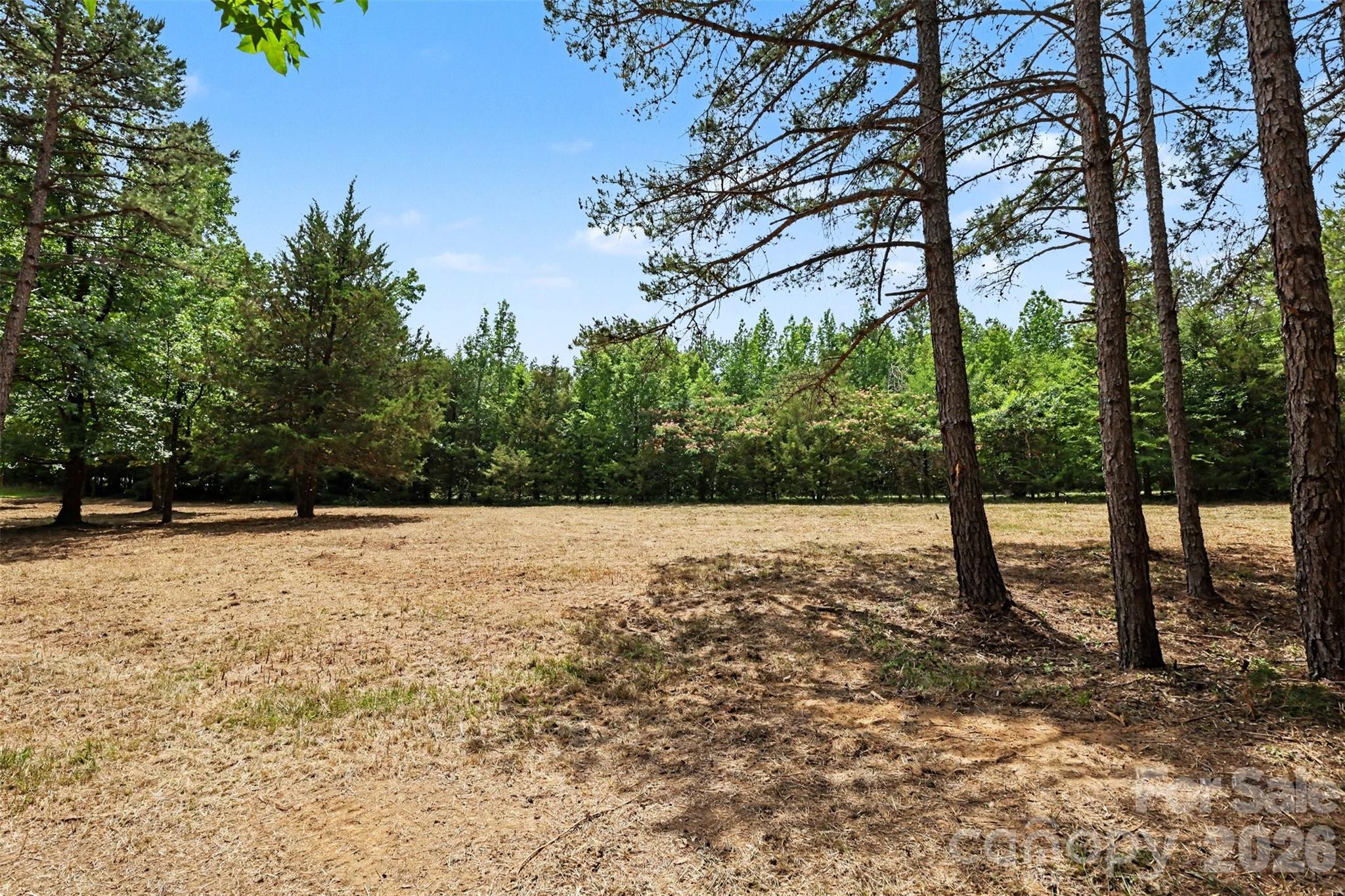 Build your dream home on this picturesque 1.79-acre homesite in sought-after Matthews. Offering a blend of open space and mature trees, this property provides the ideal setting for privacy while remaining close to everyday conveniences.
Recent AOWE completed in November 2025 with approved septic design for a 4-bedroom home. AOWE site plan,  survey, and septic information, is attached. No HOA.
Surrounded by established custom homes on large homesites, this property offers a rare opportunity to build in an area known for its spacious lots and upscale residential setting. Conveniently located with easy access to I-485, shopping, dining, and entertainment.
Existing well located on the property. Seller makes no representation regarding the condition or functionality of the well. Buyer to verify all information important to their intended use.